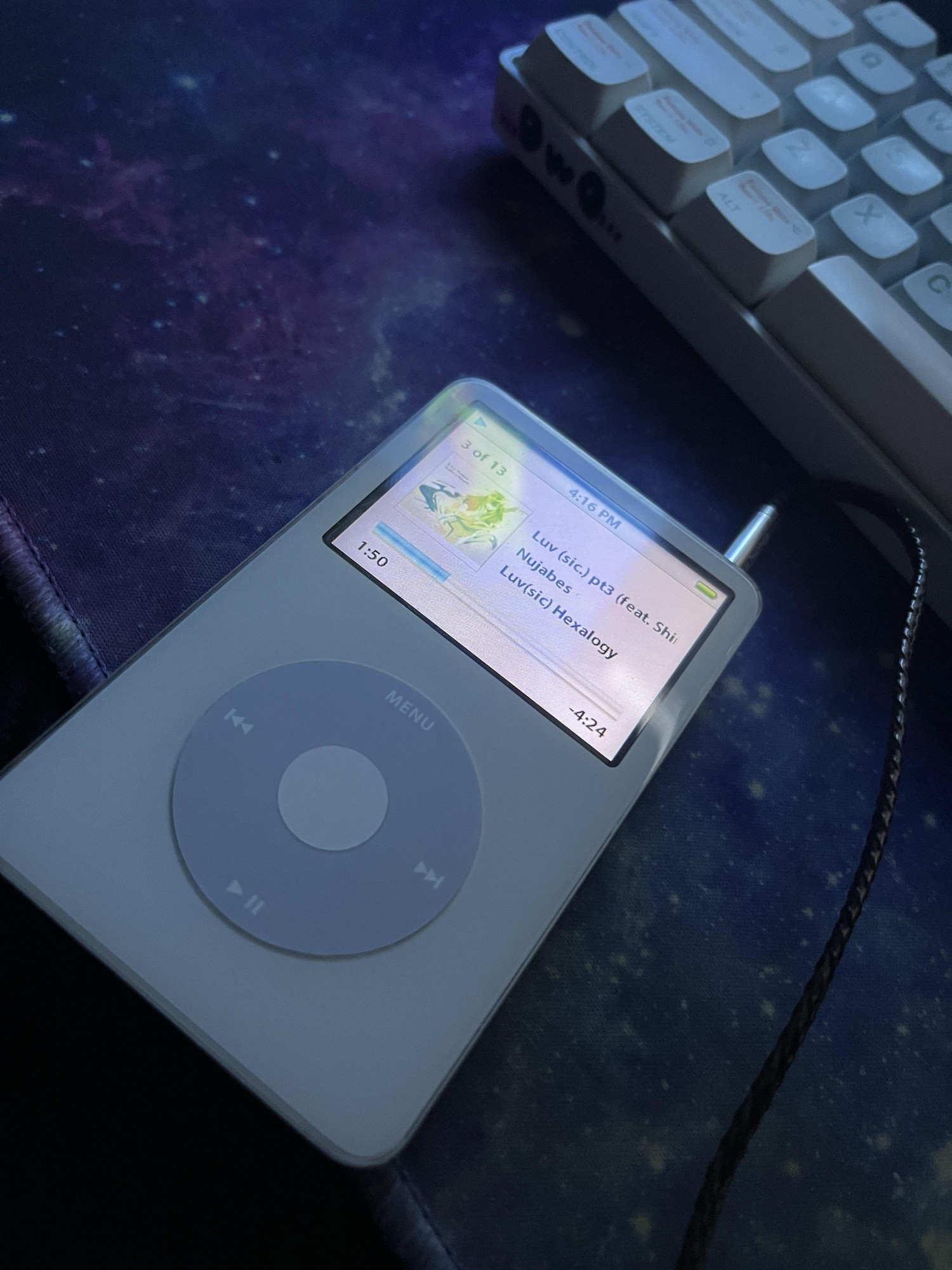 white flash modded iPod 5.5 classic, Luv (sic) part 3 by Nujabes and Shing03 playing