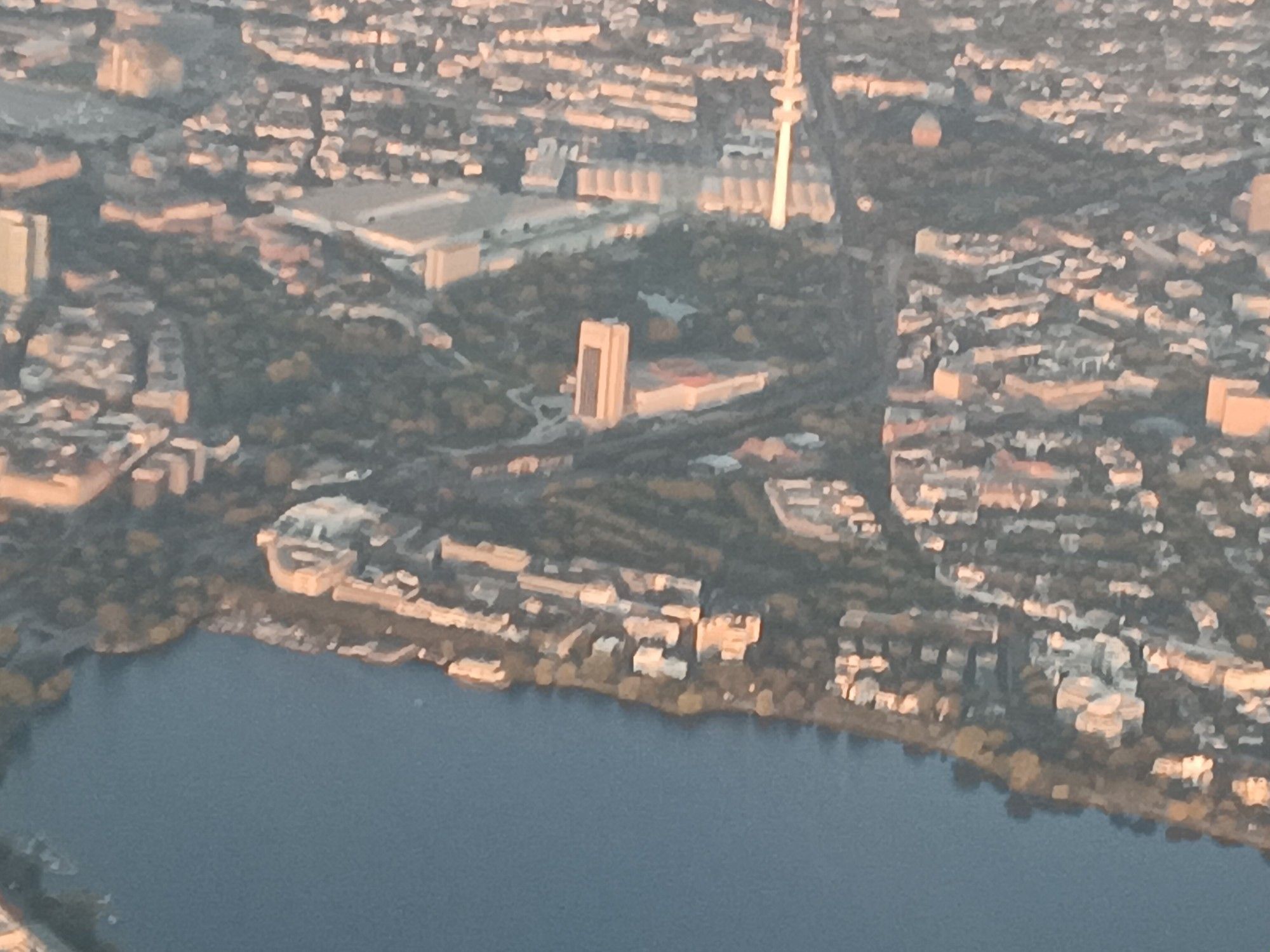 An aerial photograph of Hamburg taken from a departing plane. Showing the Eurofurence venue of CCH in the centre of the image.