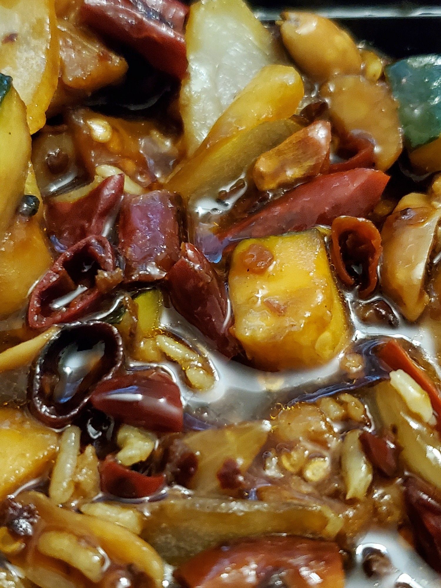 Close up of some Kung pao chicken (ok I ate a lot of the chicken already) and there is a LOT of chilis in it.