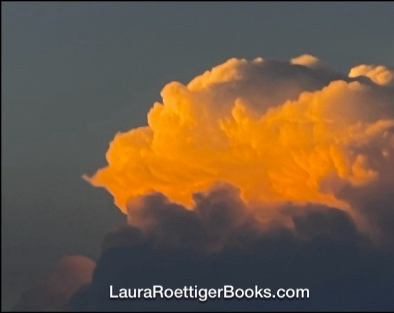 Backlit cloud glowing with dark cloud below photo by Laura Roettiger