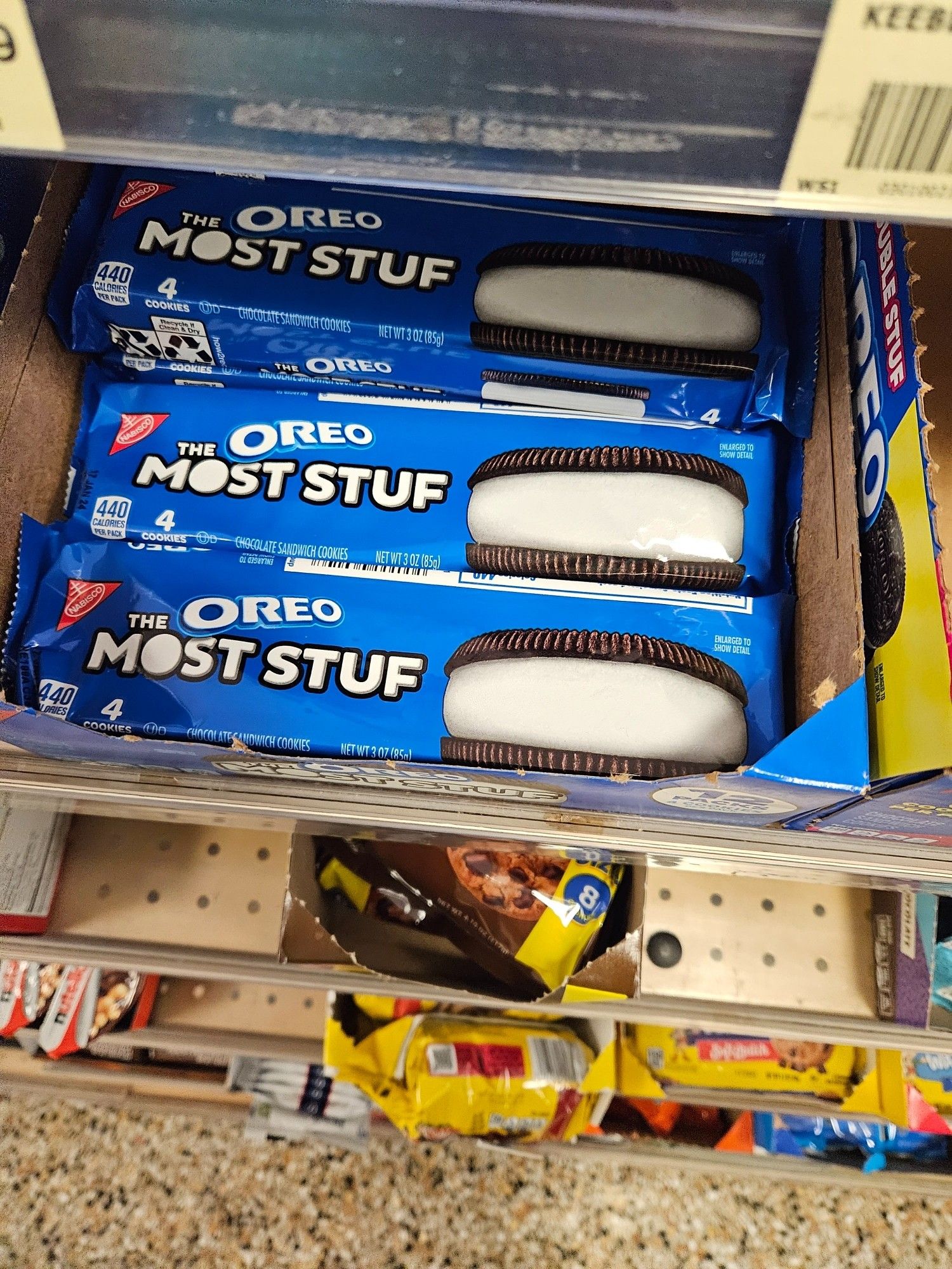 A grocery store display of "most stuff" Oreos