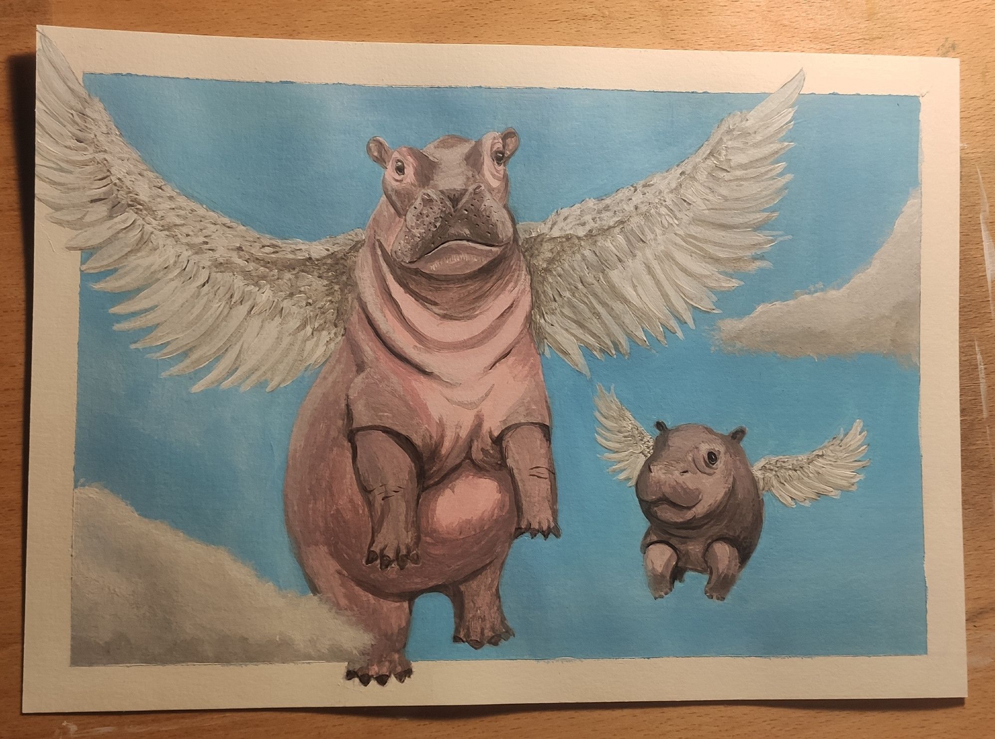 One Hippo and her calf with wing flying in the sky