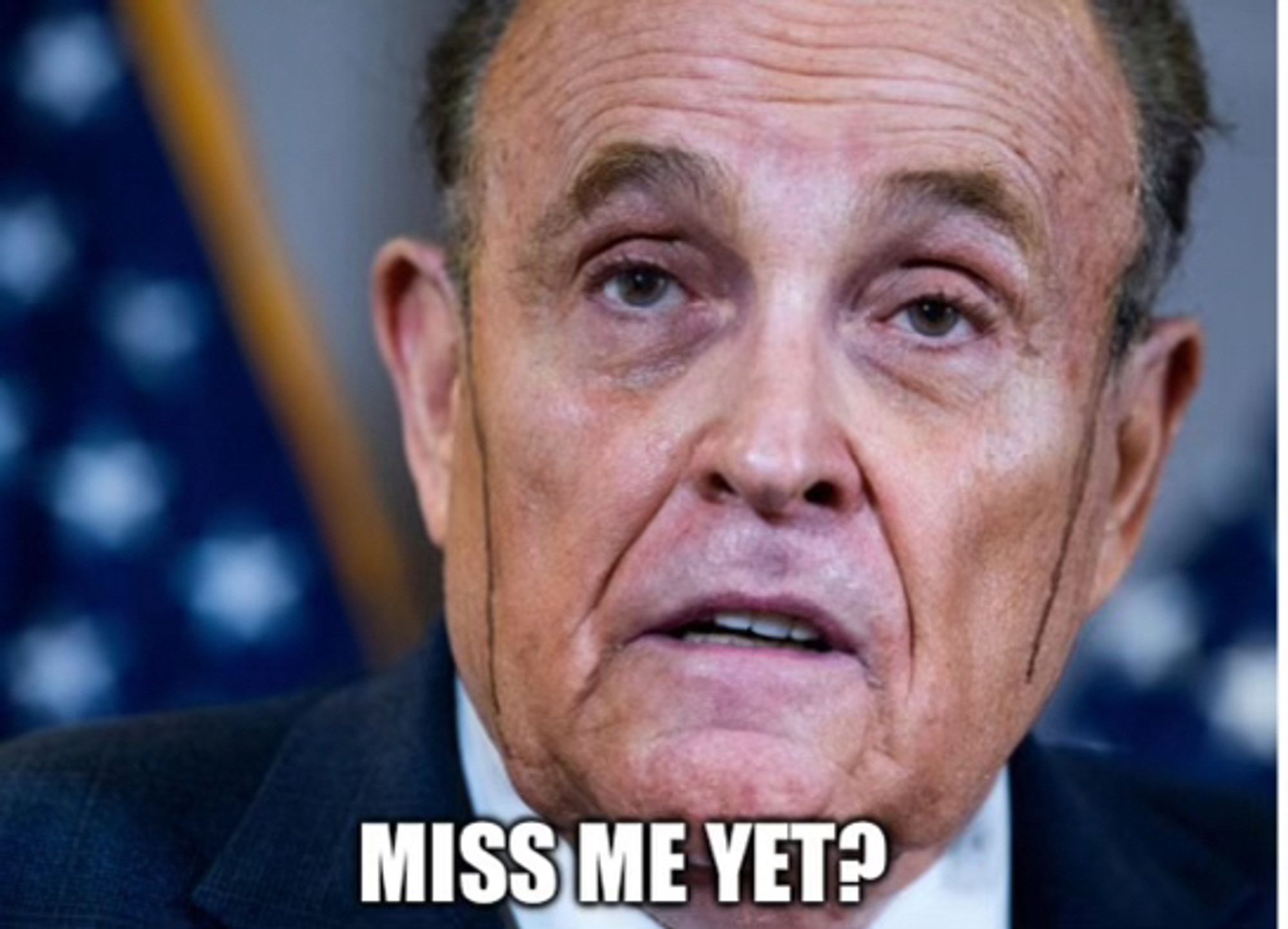 Closeup of photo of Rudy Giuliani. He's is sweating with streaks hair dye dripping down his face.

Caption: Miss Me Yet?