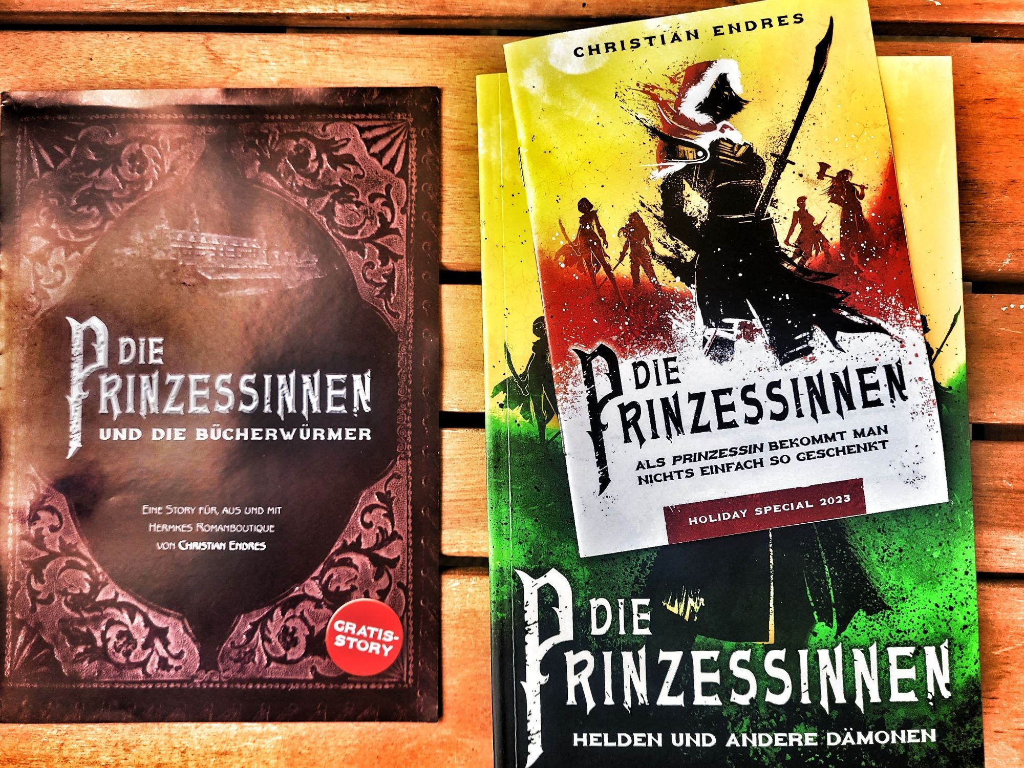 Der neue Prinzessinnen-Roman "Helden und andere Dämonen" plus dem "Holiday Special 2023" und der exklusiven Gratisstory "Die Prinzessinnen und die Bücherwürmer"