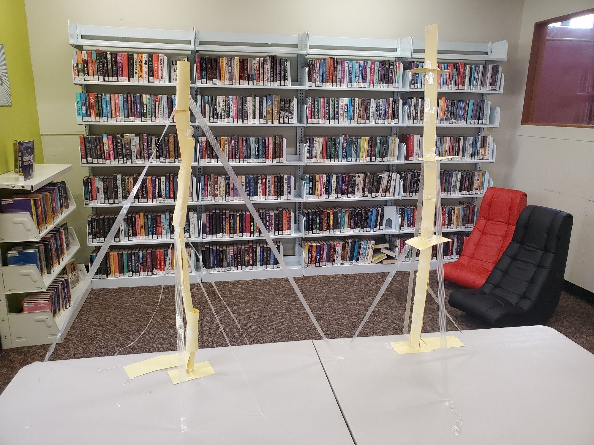 Photo: Two index card tree towers stand side by side, measuring 37 and 42 inches.