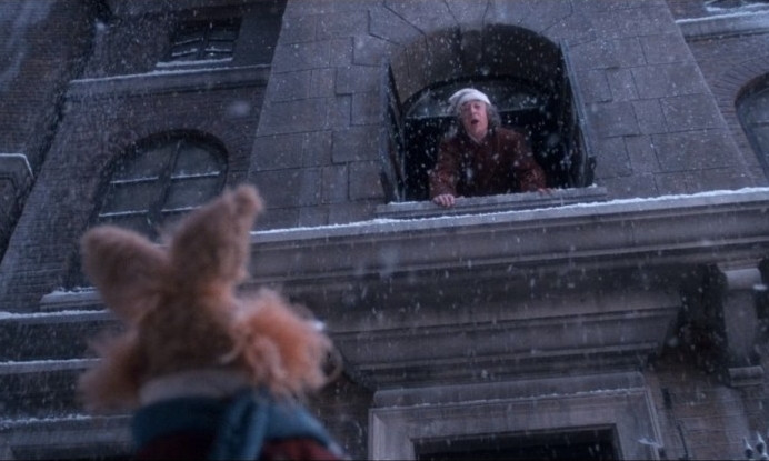 Muppet Christmas Carol: Scrooge calls down to the bunny kid in the street. 