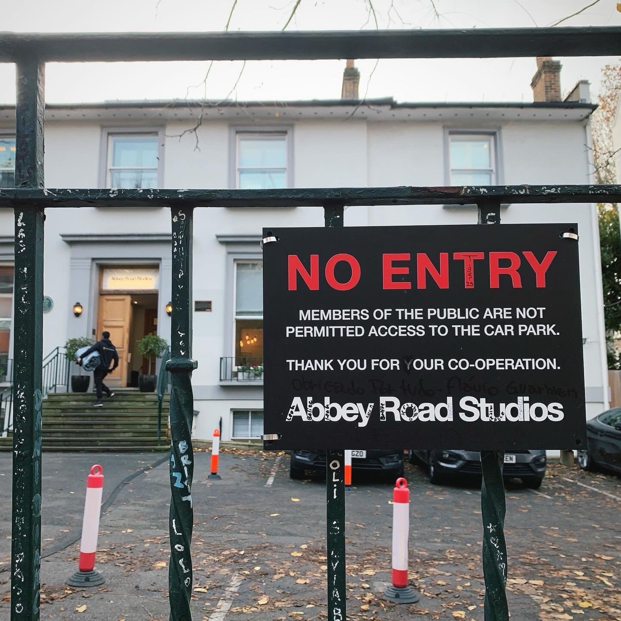 A sign that says No Entry, on Abbey Road Studios’ fence, as the car park is only available to staff and artists.