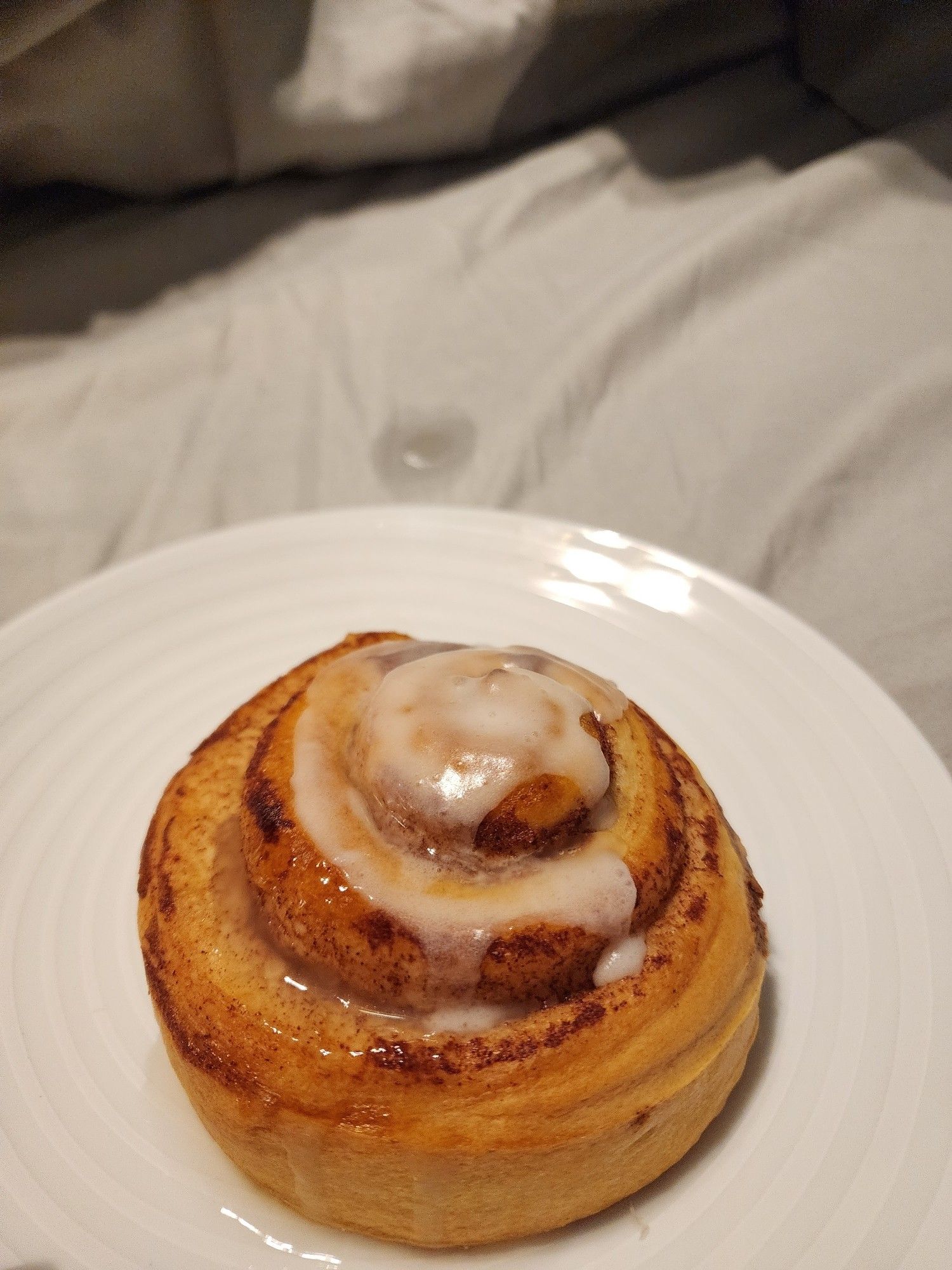 Picture of the cinnamon roll in better light, it's got cum on it. You can also see a little wet spot on the sheets past the plate where juni accidentally shot a bit too far