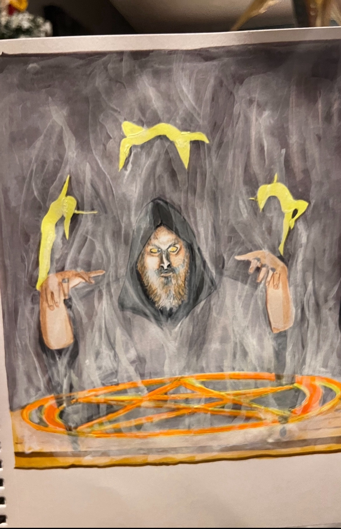 Portrait of Andrew in a cloak practicing witchcraft. 

There is a pentagram that has begun to lift from the table. Spirits of witches are dancing around his head.