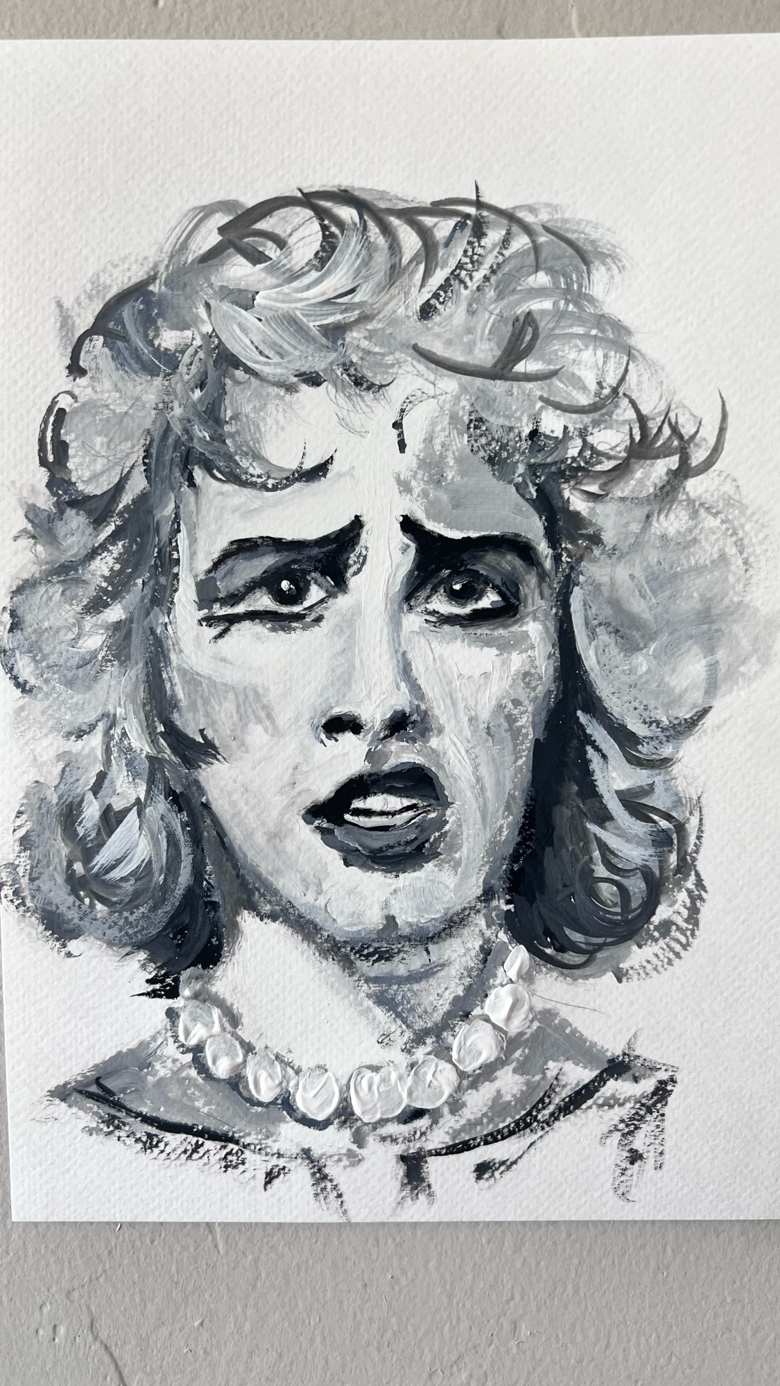 Black and white portrait of Tim Curry in The Rocky Horror Picture Show 