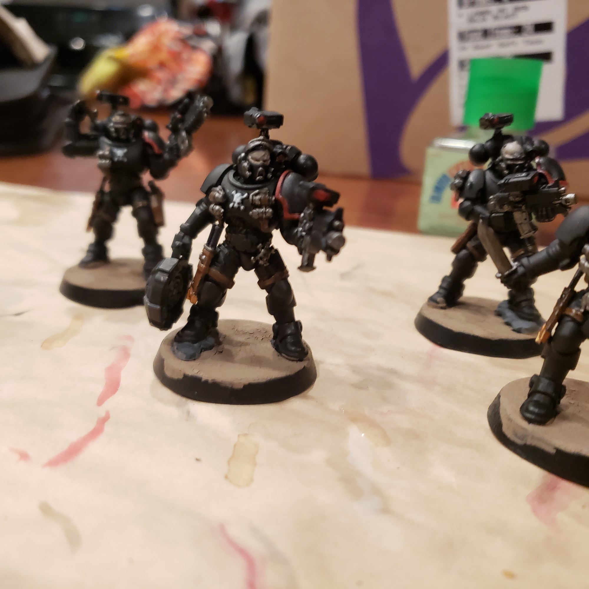 Raven guard incursors, 3rd company, center marine holding haywire mine.