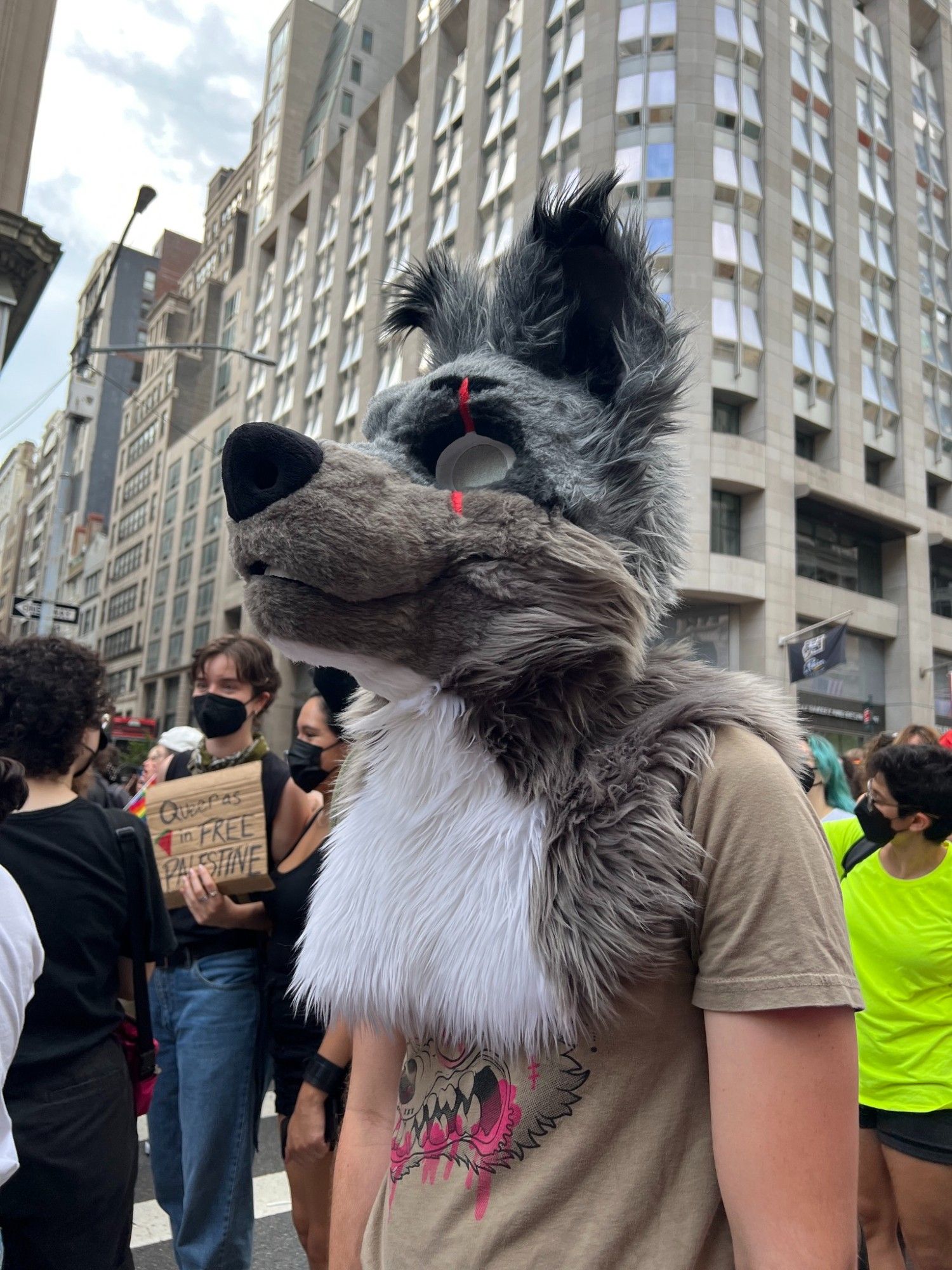 A brown partial fursuiter in the middle of NYC