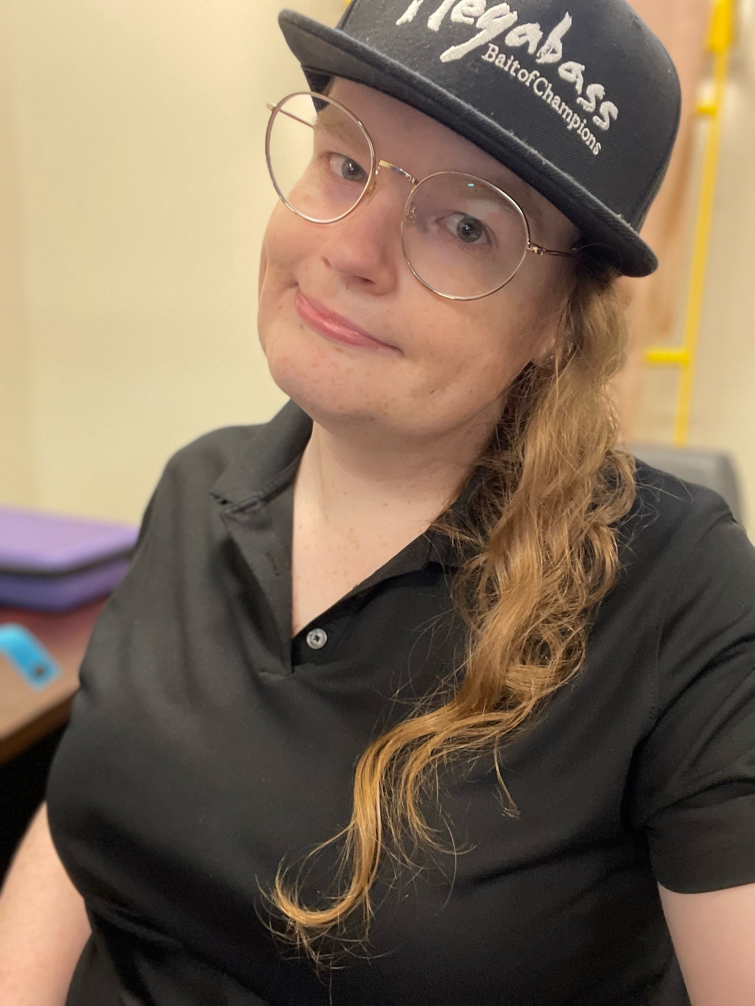 viola in its work shirt and megabass hat, looking a little tired