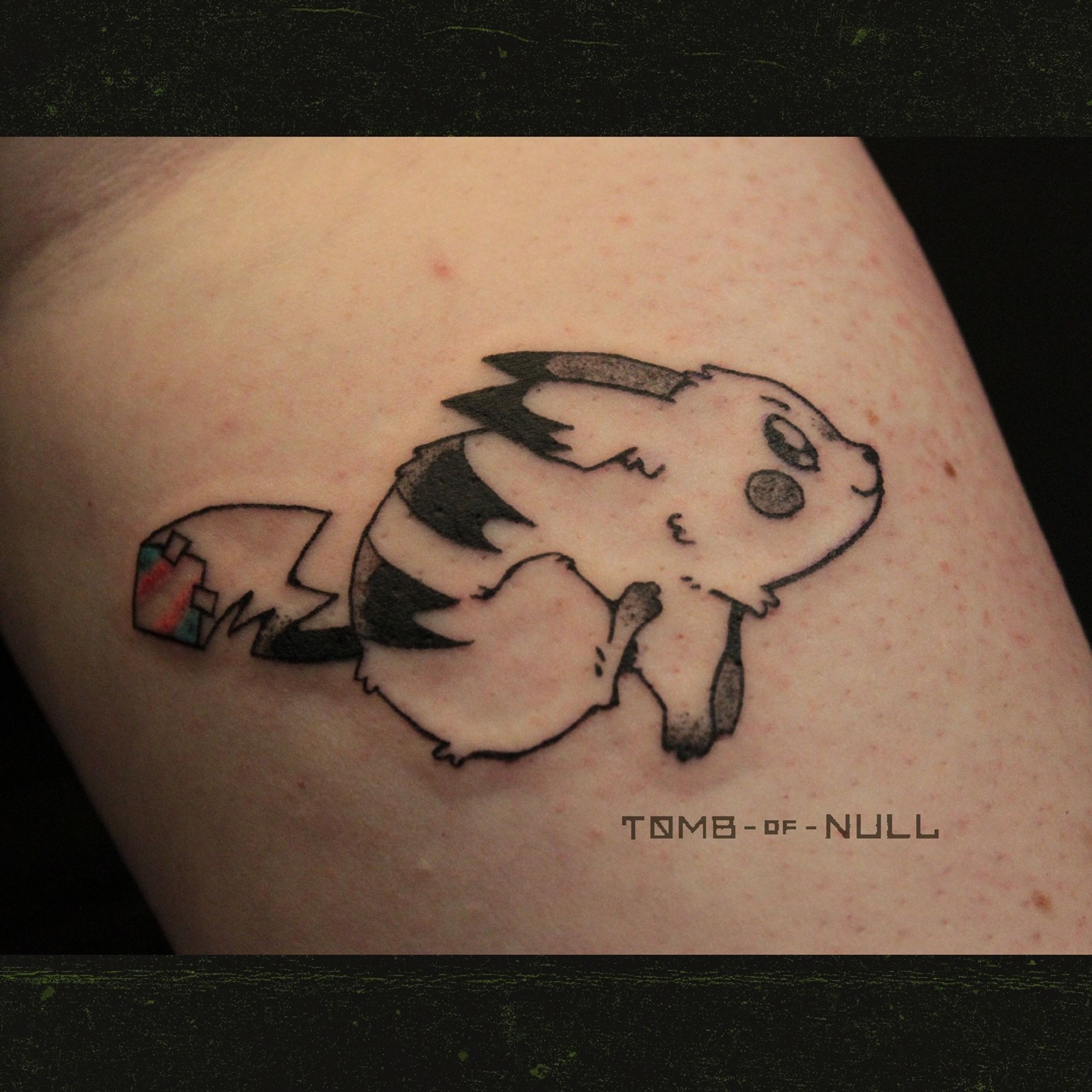 A dashing pikachu tattoo done on pale skin. Their tail sports a diamond shaped flag baring the trans flag.