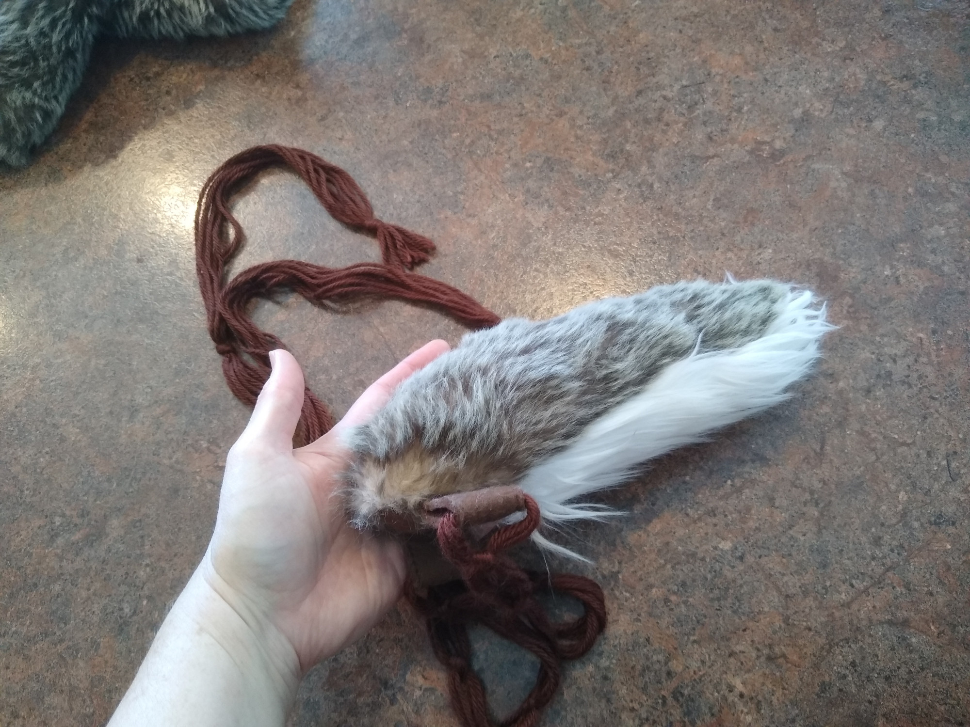 the matching deer tail. the belt cord is macrame'd yarn and the tail is light and very comfortable to wear