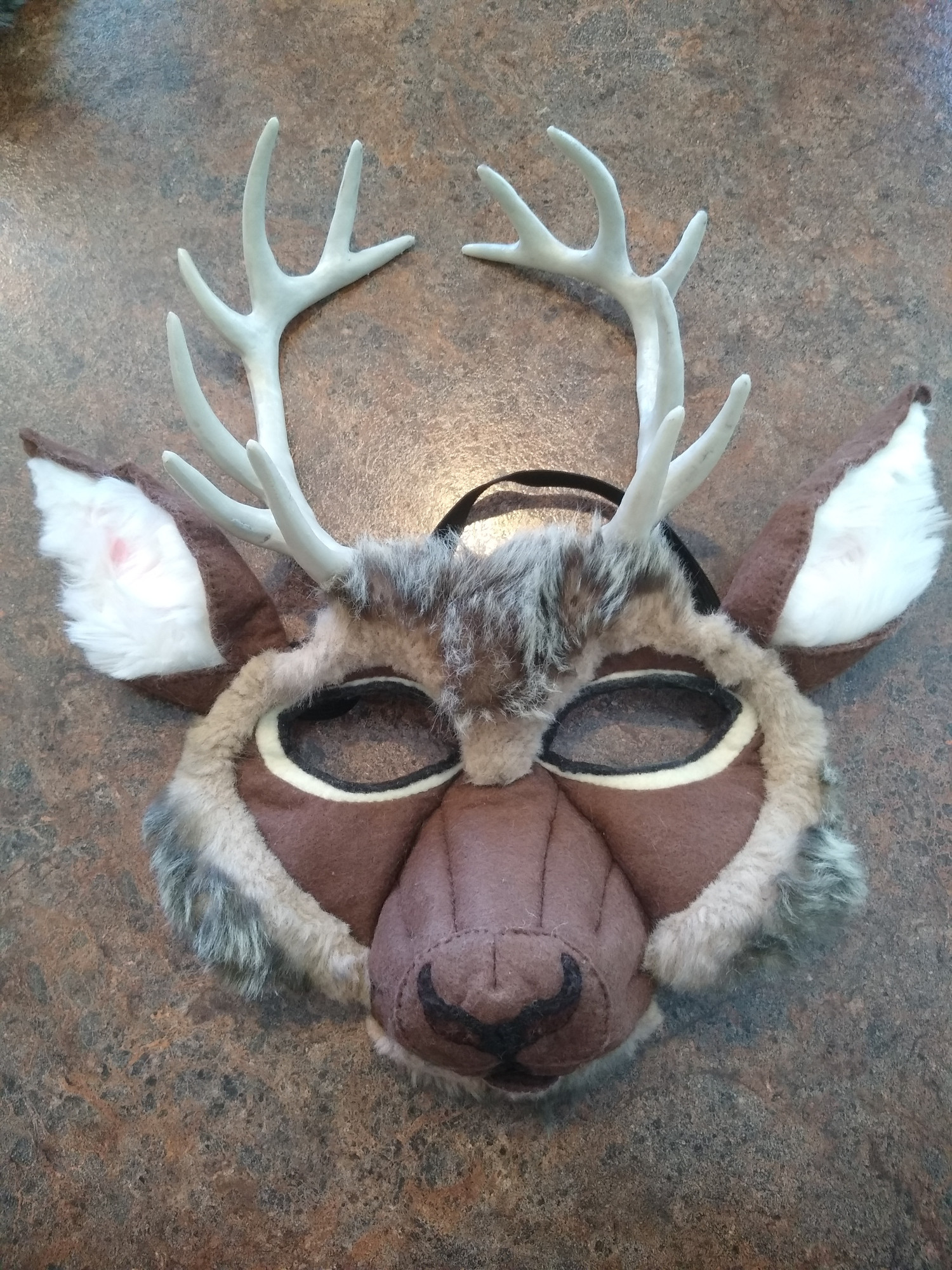 deer mask, made from felt, faux fur, and plastic antlers. hand sewn, hand painted!