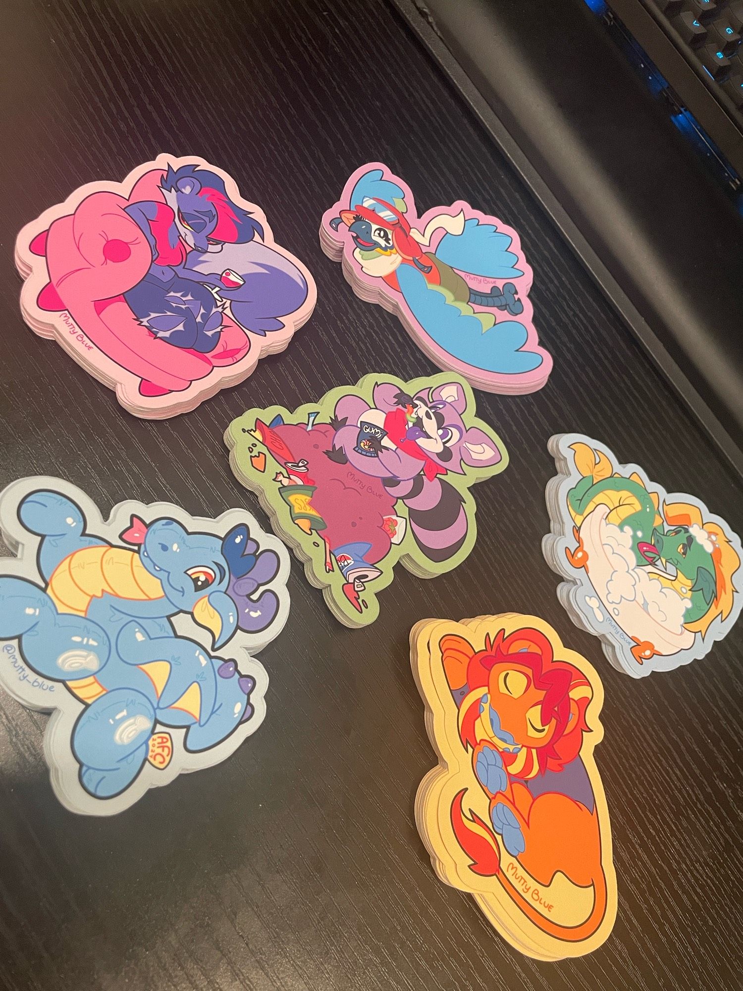 6 stacks of matte stickers on a black desk

#furryart #furry #anotherfurrycon #furcon #indigopark