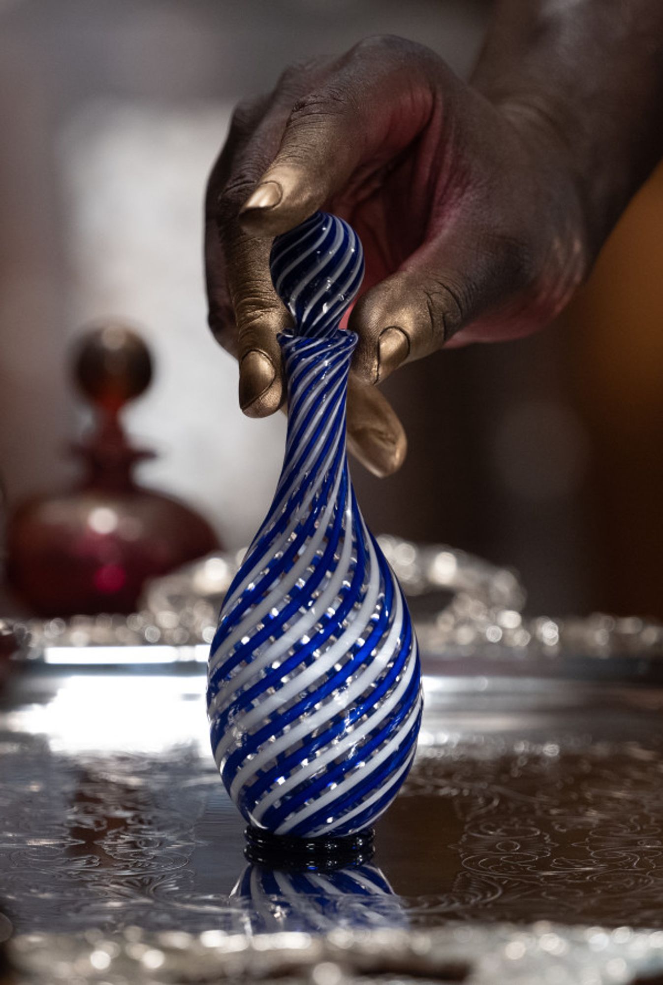 The white and blue glass bottle that we keep Idris Elba in, from the movie Three Thousand Years of Longing.