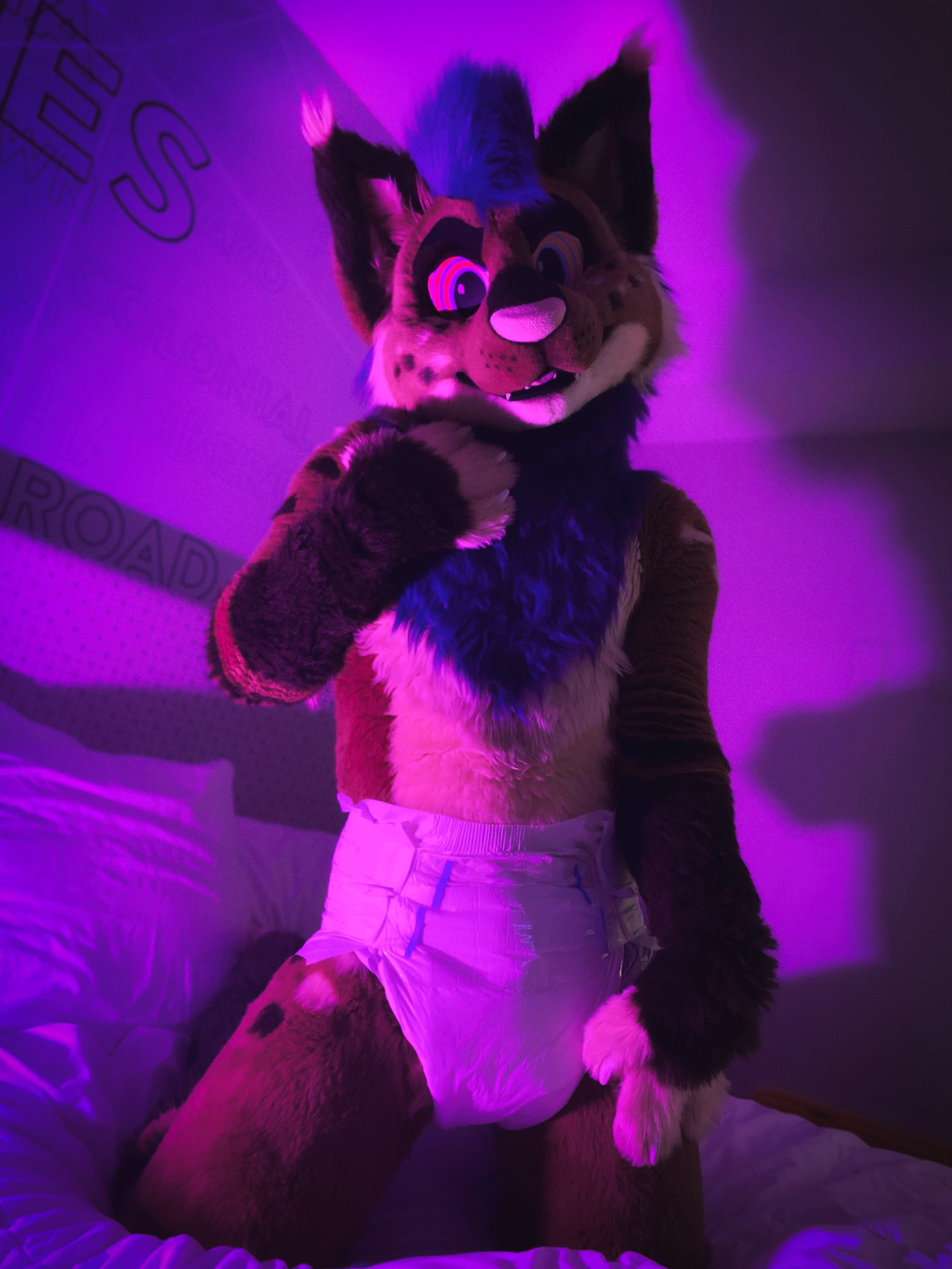 Strobes in fursuit and a plain white diaper, kneeling defiantly on the bed and declaring that they are NOT afraid of any monsters under the bed because  any beasts will get body-slammed by a padded butt, MROW.