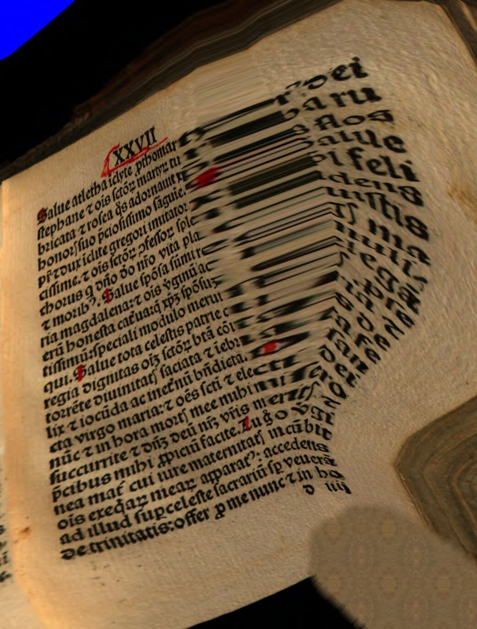 A scan from an early modern book where lots went wrong. You cannot read the text, and you see a finger that has been removed by a software.