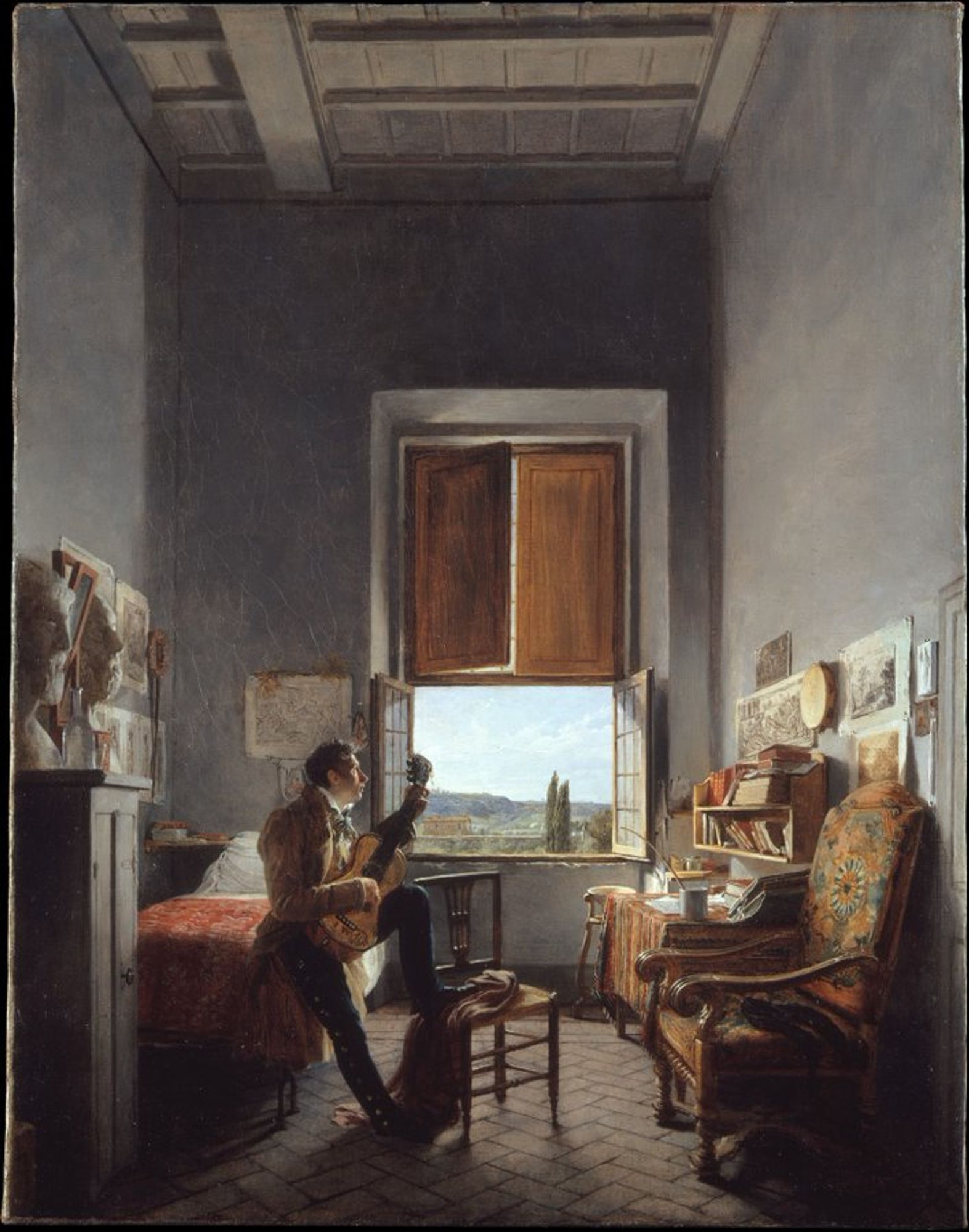 The painting is titled Léon Pallière (1787–1820) in His Room at the Villa Medici, Rome, and was painted in 1817 on oil. The artist: the French Jean Alaux. A man with a guitar is standing in a room with a view.