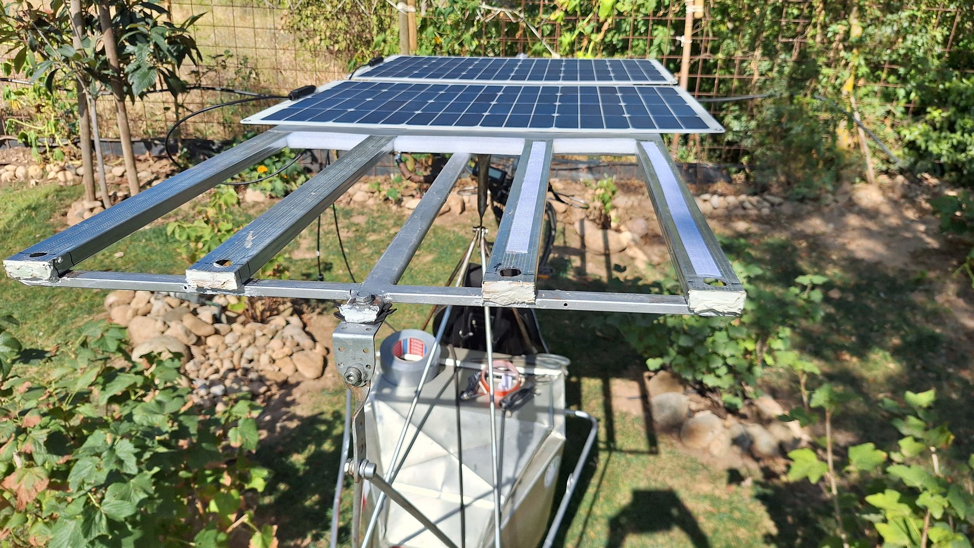 Detail of construction of solar roof on solar bike.