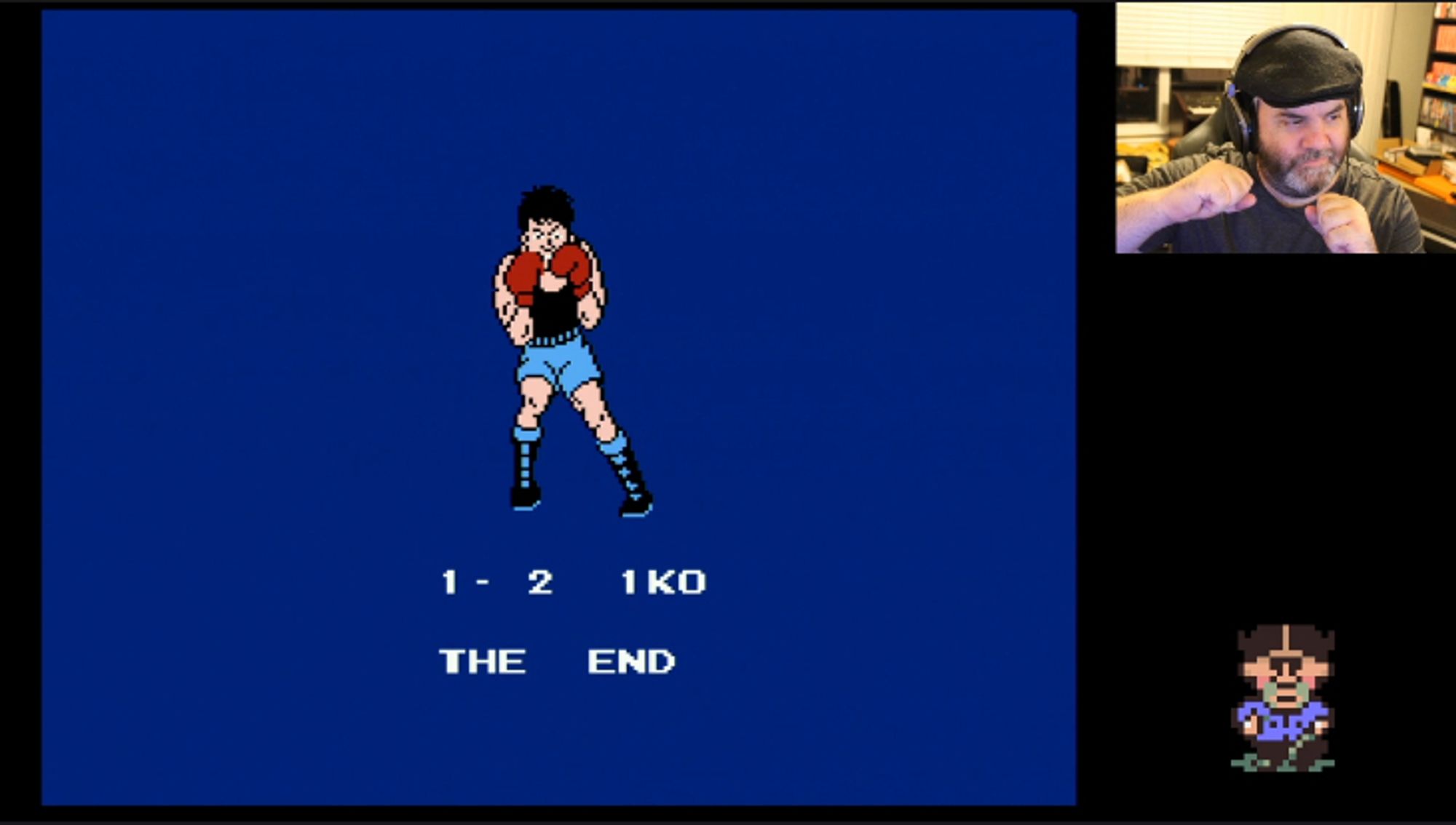 screenshot of my Twitch stream where I'm shown emulating Little Mac's victory pose from Punch-Out!! during The End screen