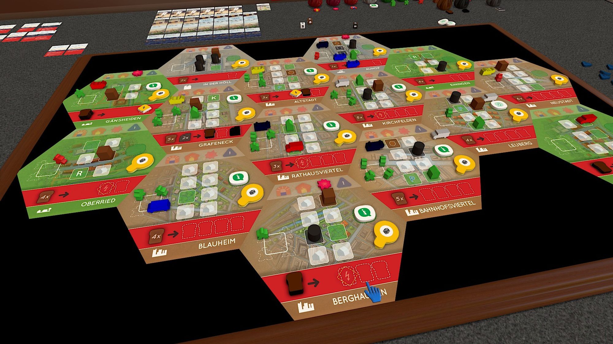 Game board of Neustart in Cabletop Simulator. A modular city layout with various vehicles, ressources and markers on each city quarter.