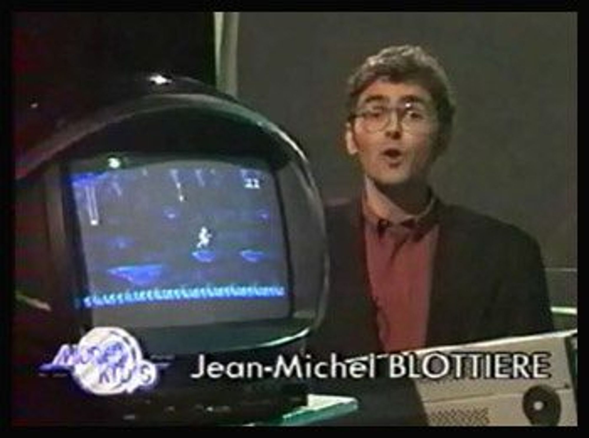 a still of the Micro Kid's french show, showing Jean Michel Blottieres, next to a TV Set showing Star Wars for NES if I'm not wrong