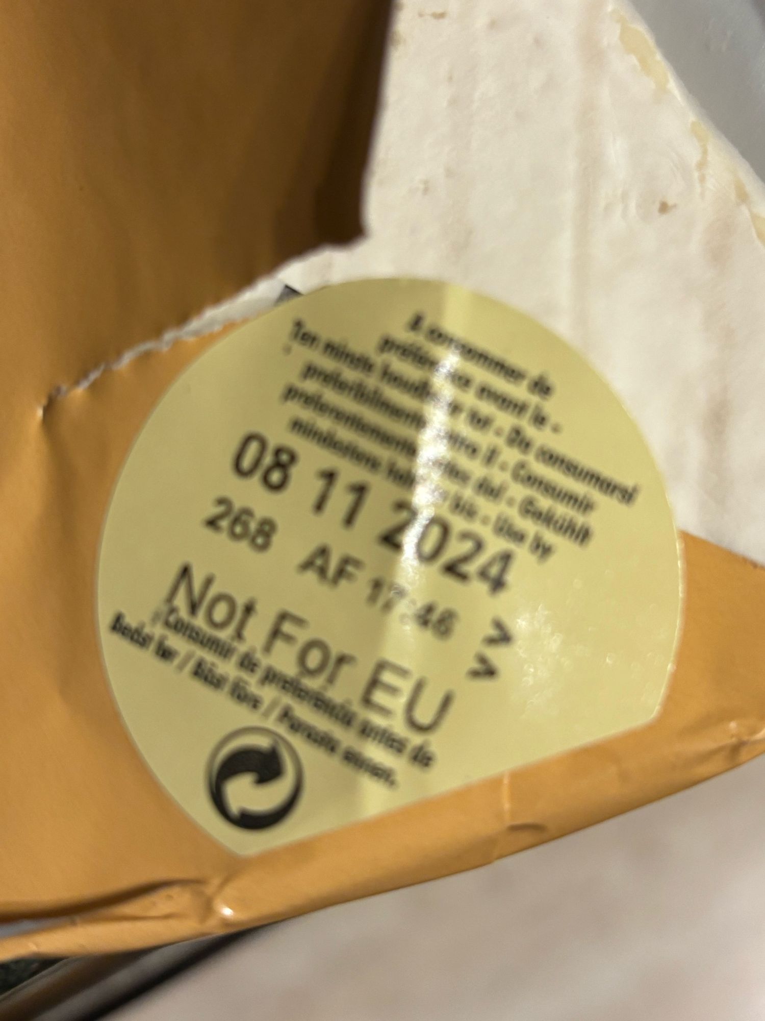 A “not for eu” label on a wedge of brie