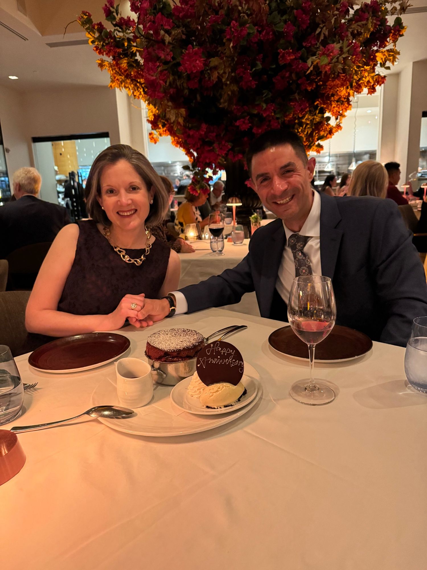 Couple eating dessert.