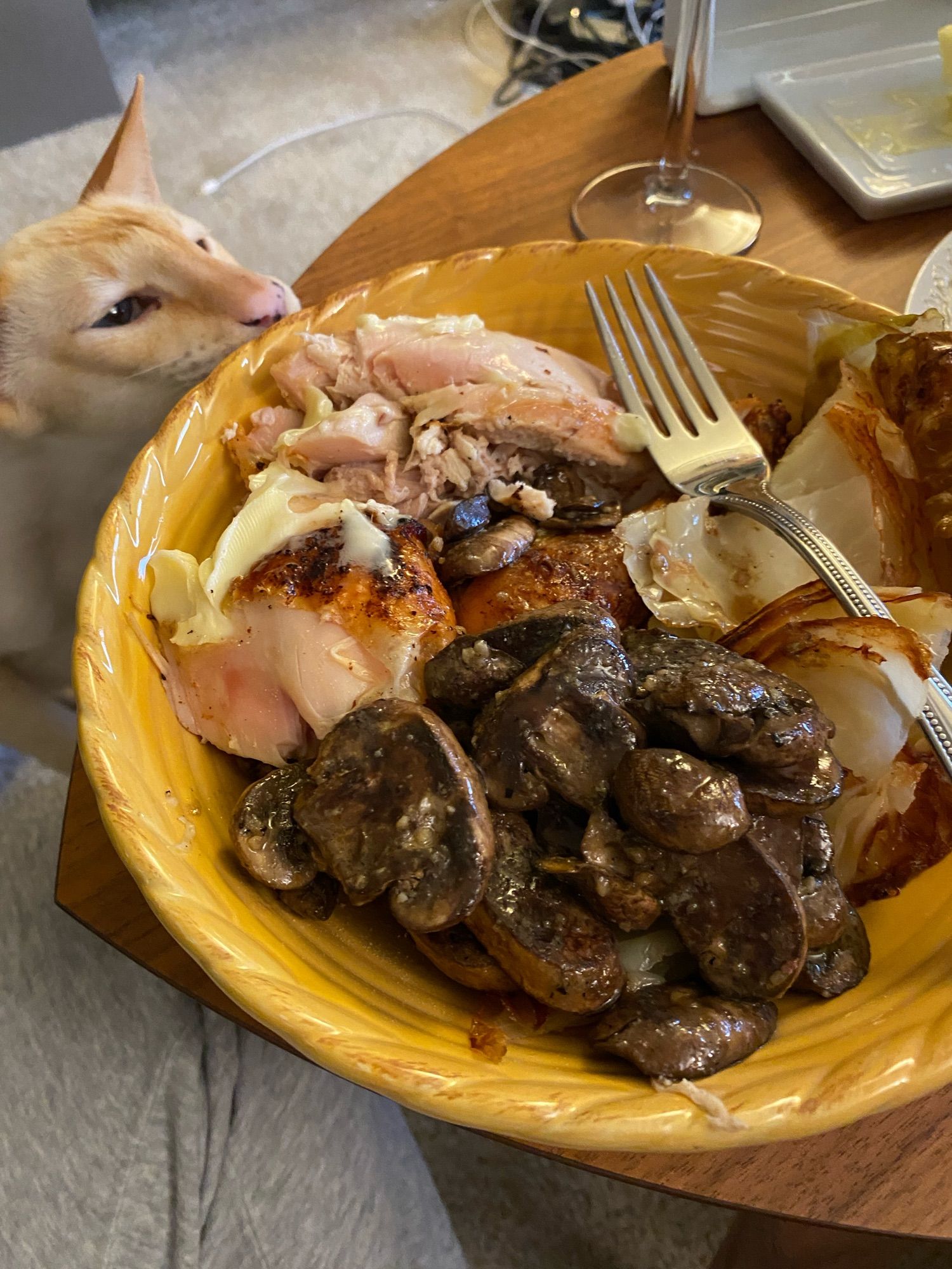 Roast chicken, schmaltzy cabbage, mushrooms looking gorgeous. White cat desiring a taste in the corner