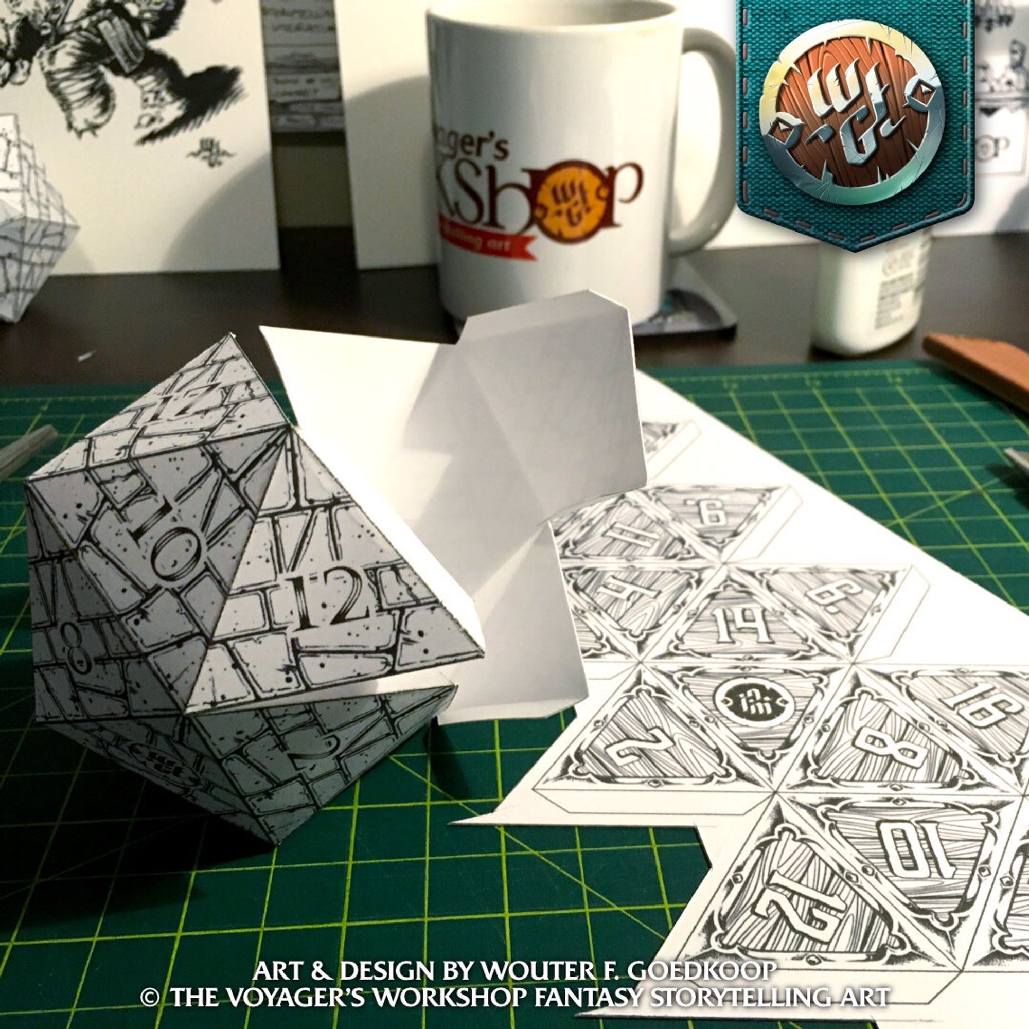 A paper D20 being assembled.