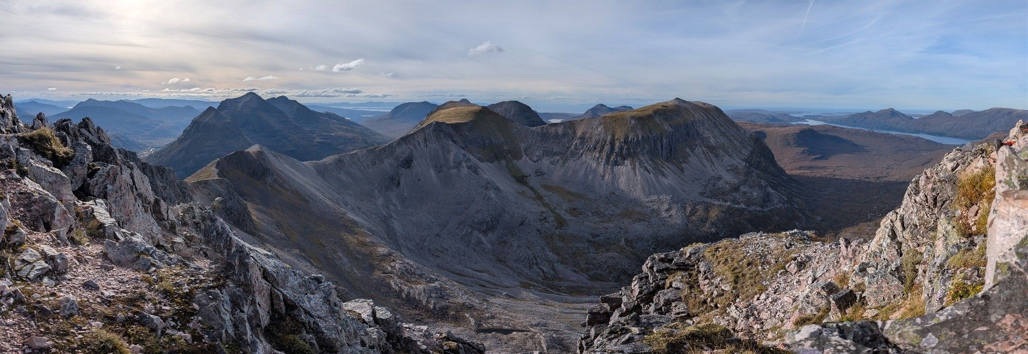 A panorama of Beinn Eighe with Liathach, Skye, and all points west.