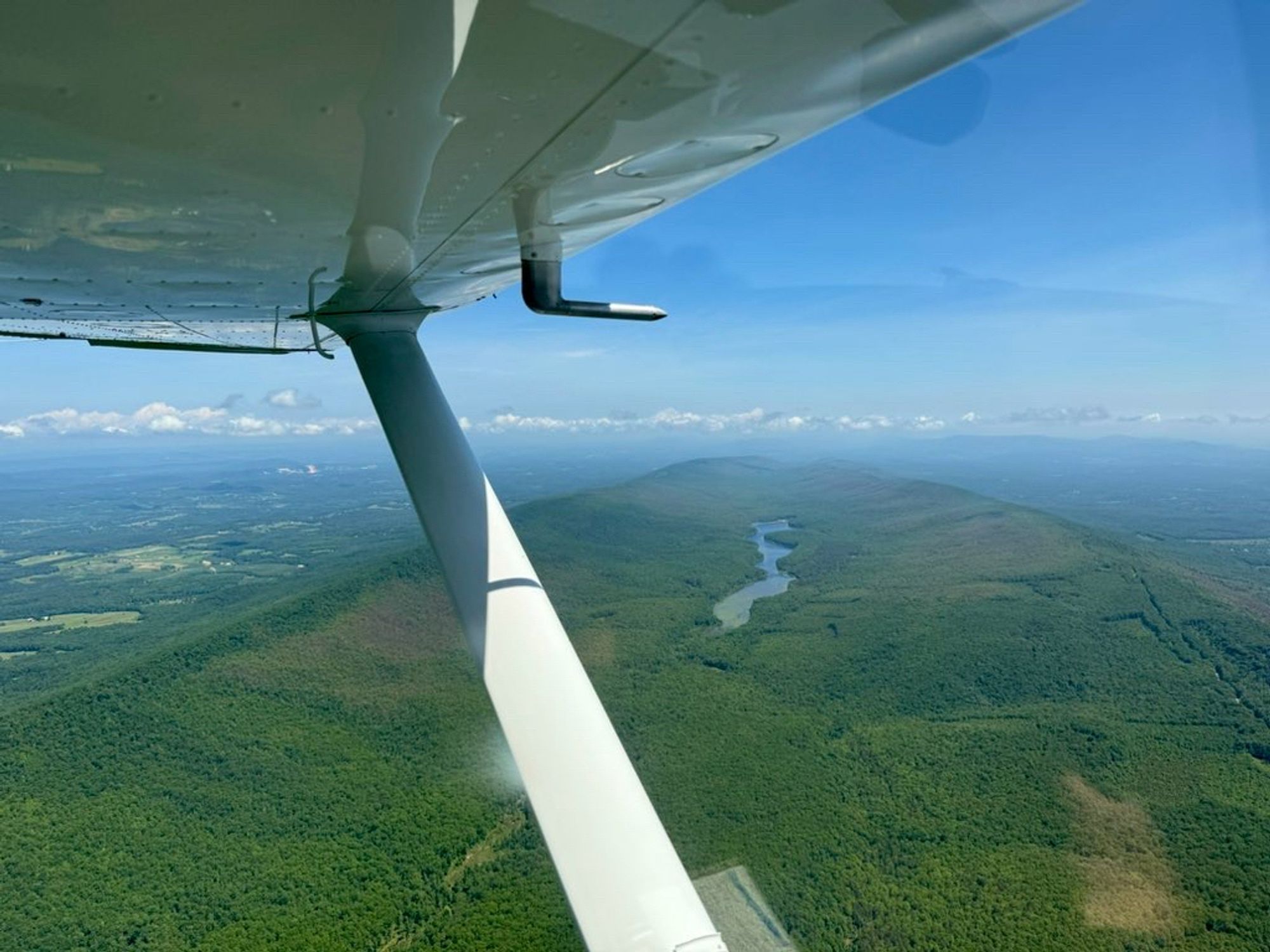 View of the lake between two crests of a mountain