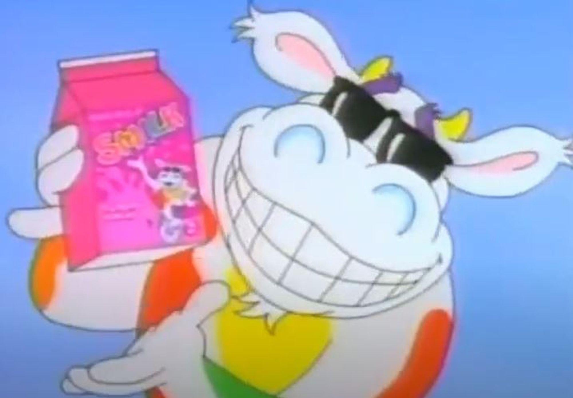 A rad cow with colorful spots and attitude, wearing shades, holds up a pink milk carton and smiles