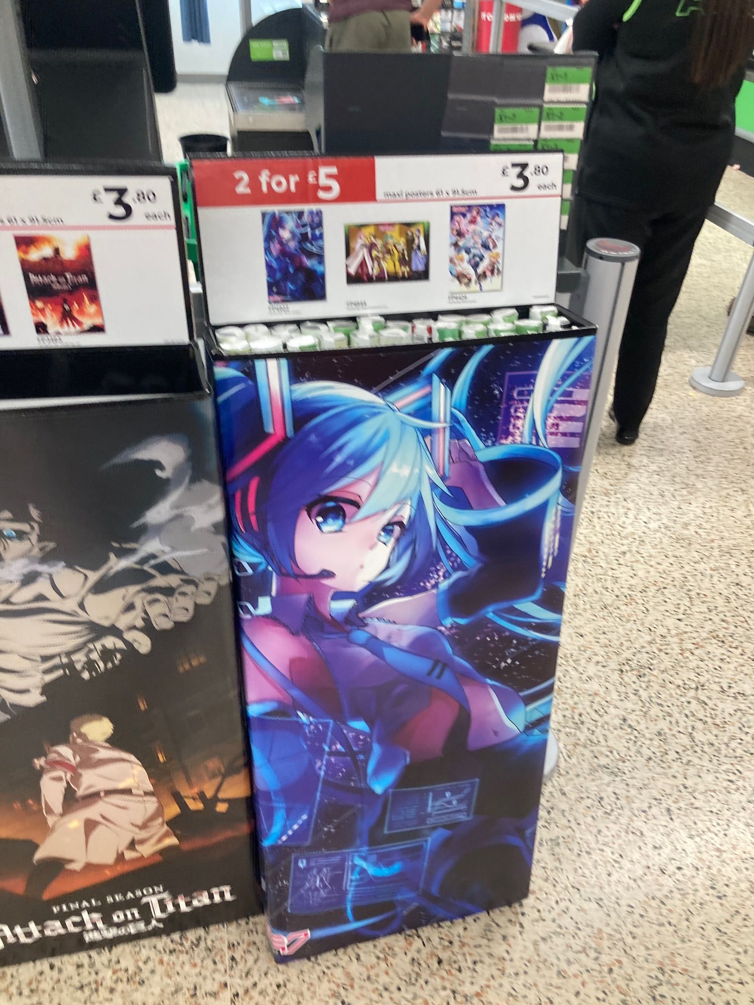 asda display of hatsune miku posters 
