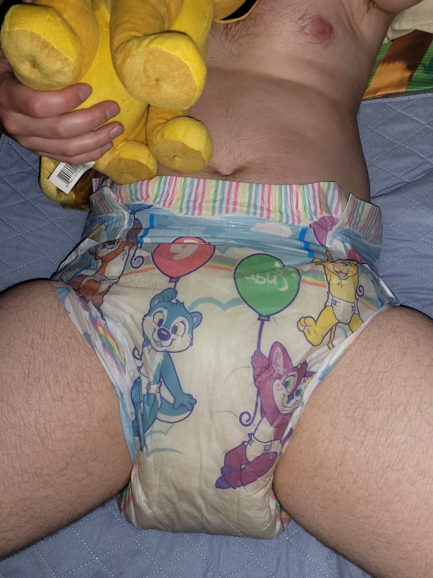 Kitten REALLY wanted everyone to see how yellowed and swollen his warm, thick diaper is. He's clearly a very good boy, but his pp must be having a field day in there...poor lil guy!