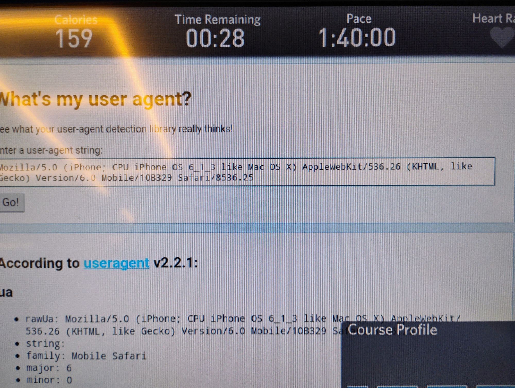 The screen of a treadmill, showing its browser navigating on a website that returns its User-Agent, which is said to be "Mozilla/5.0 (iPhone; CPU iPhone OS 6_1_3 like Mac OS X) AppleWebKit/536.26 (KHTML, like Gecko) Version/6.0 Mobile/10B329 Safari/8536.25".