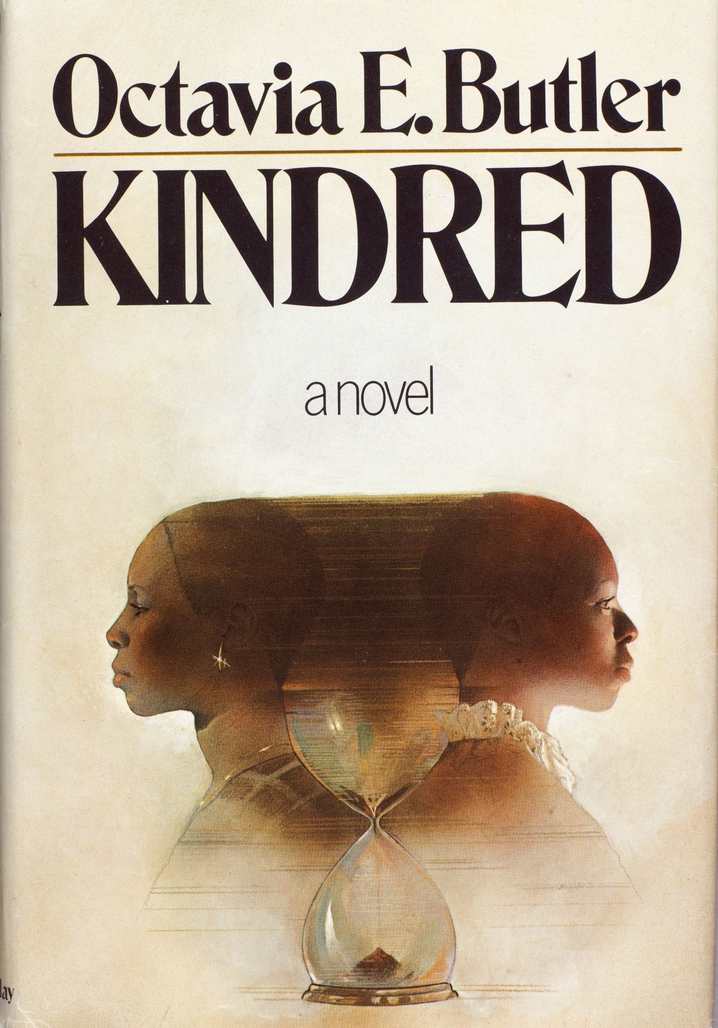 Octavia E. Butler
KINDRED
a novel

The front of the move depicts a black woman facing left and the same woman facing right, but the one facing left is in modern clothes and the one on the right is in slavery-era clothing. In the middle is an hourglass that fills the space between the women, with bit of sand already filling up the bottom portion.