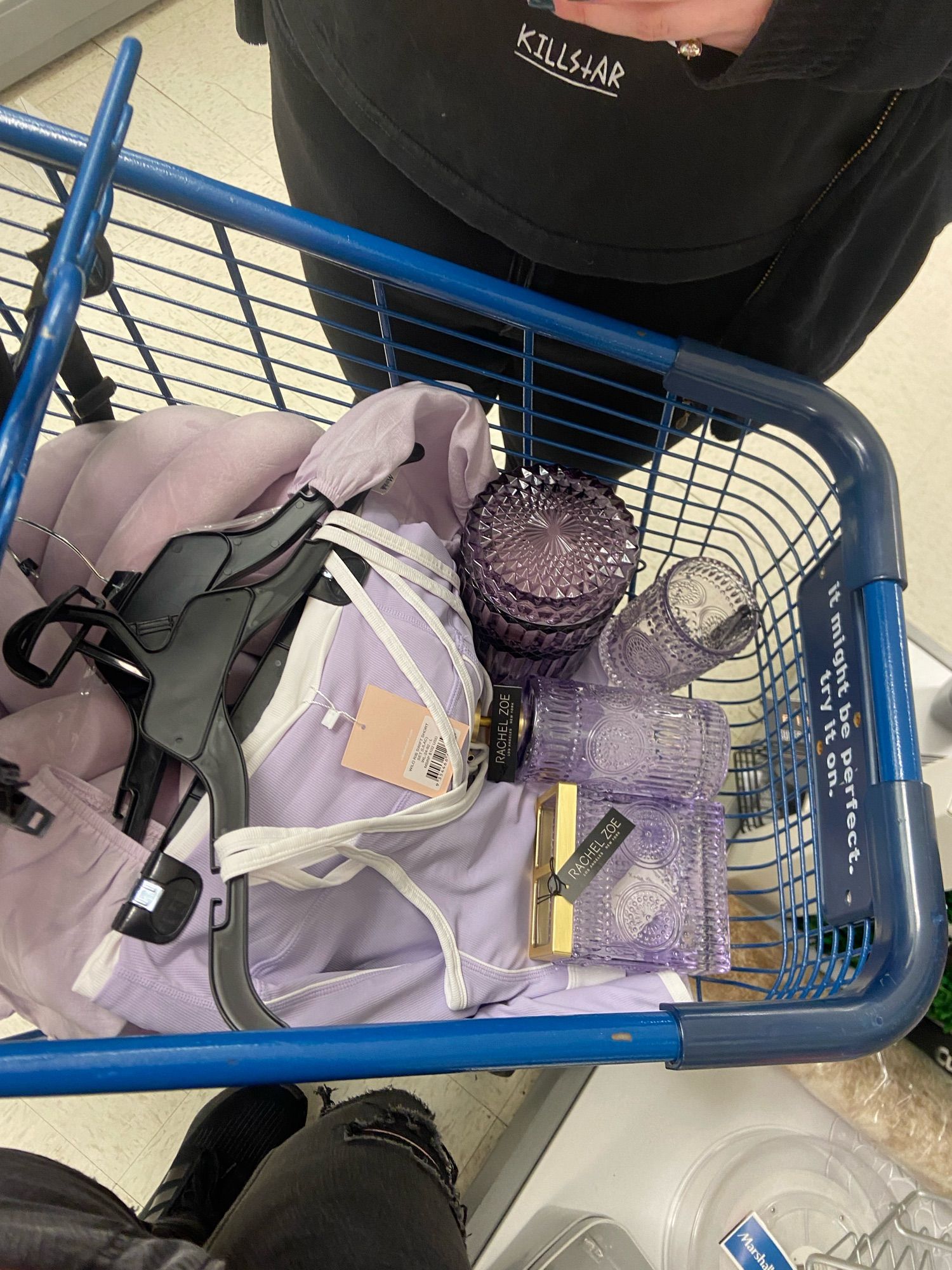 A shopping cart with various purple items