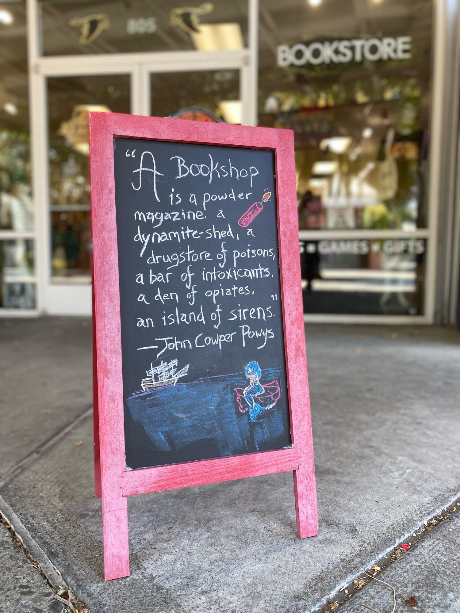 A photograph of a chalkboard in front of the Word Horde Emporium of the Weird & Fantastic, an indie bookstore located in Petaluma, CA.