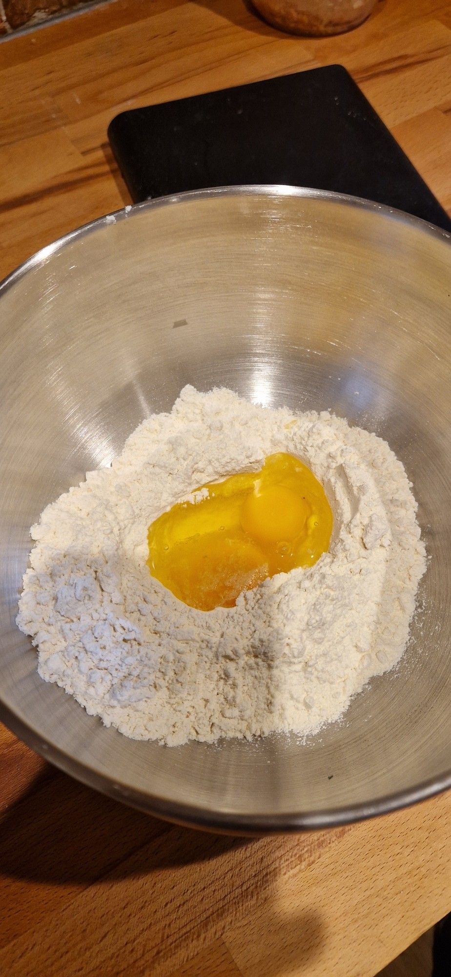 100g of flour per egg and a pinch of salt.