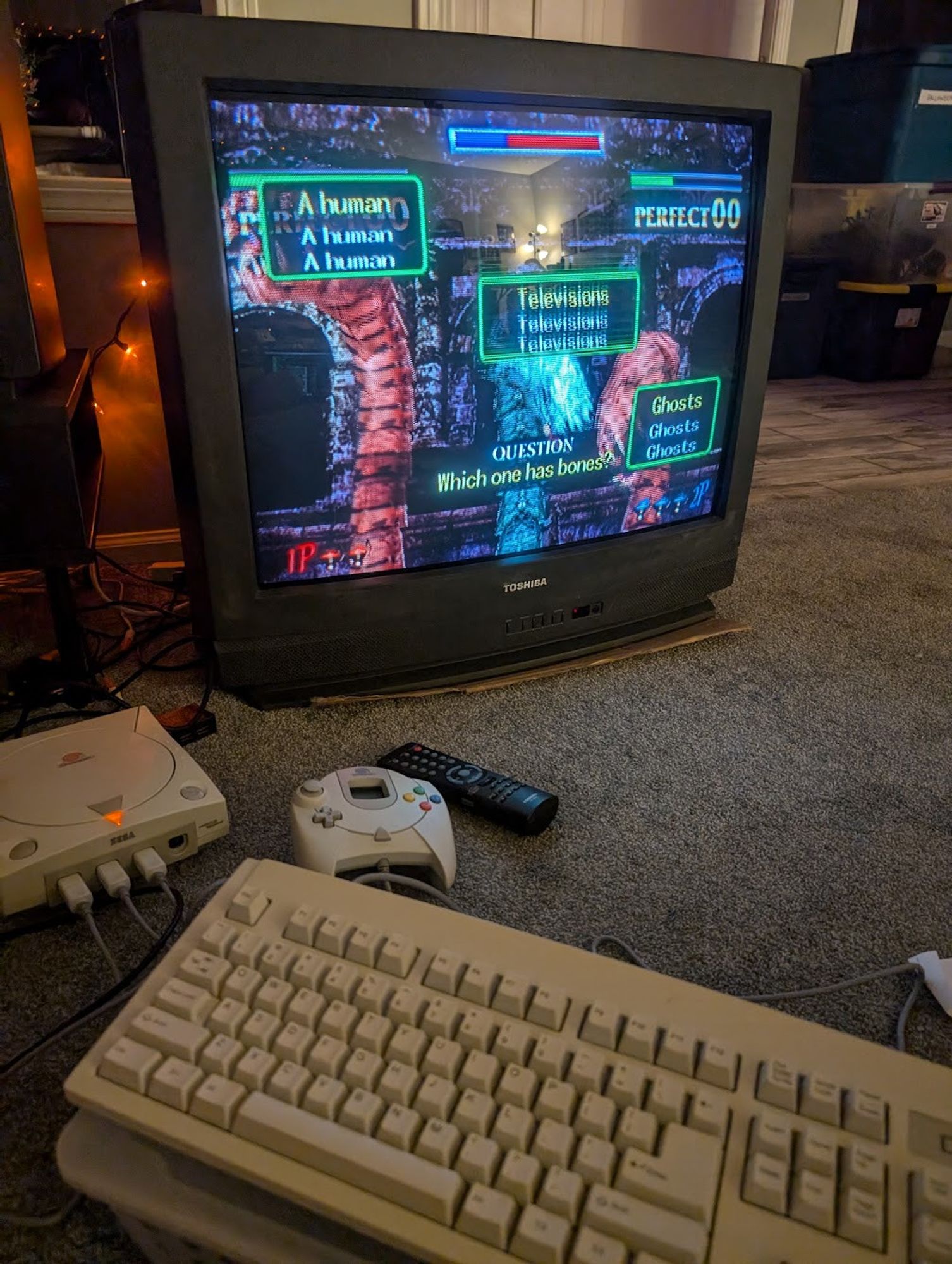 A Dreamcast, keyboard, and Typing of the Dead on the quiz boss level. Which one has bones? A human, televisions or ghosts?