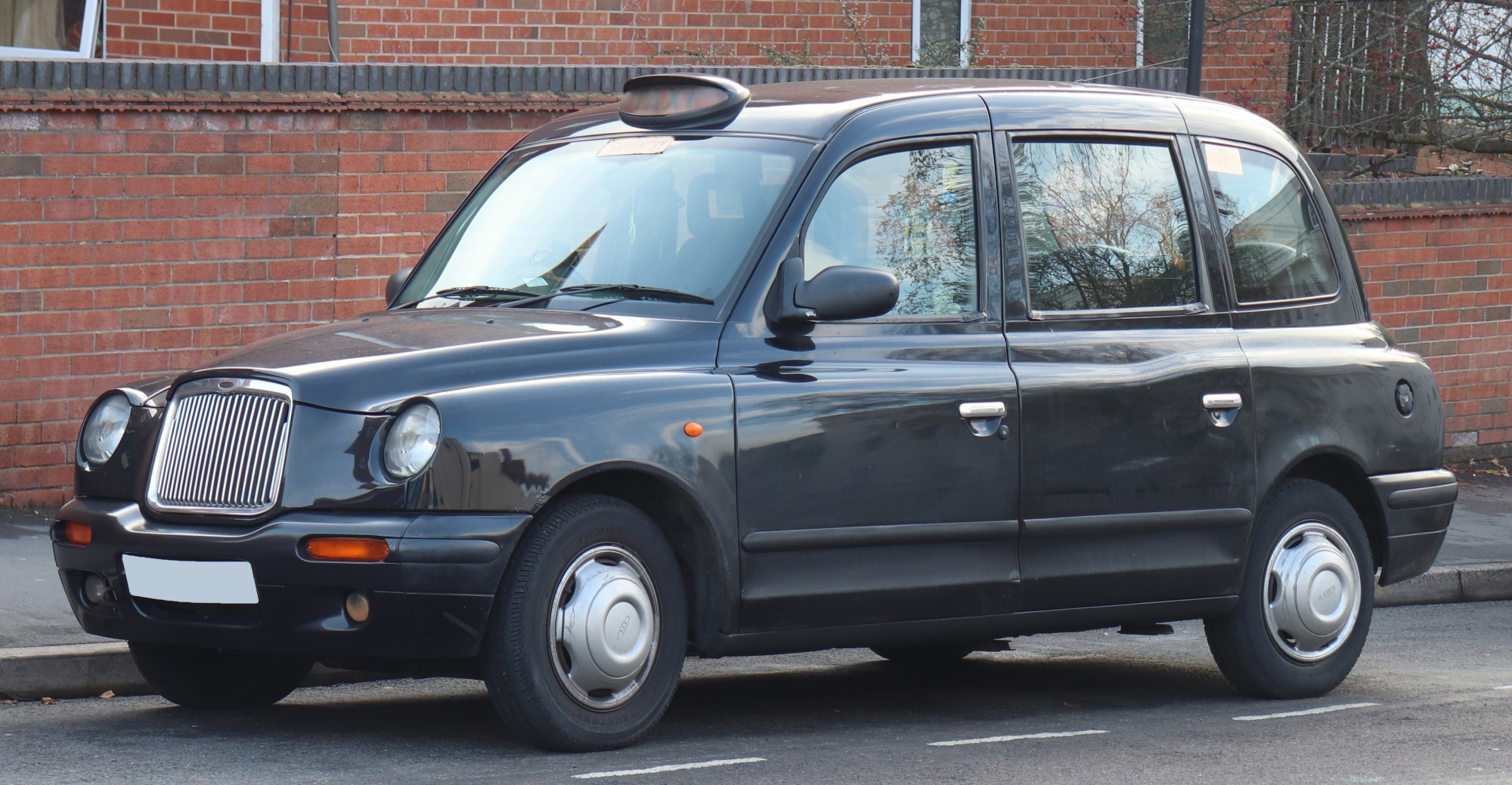 A London "Hackney Carriage" black cab

Source: 
https://en.wikipedia.org/wiki/Hackney_carriage