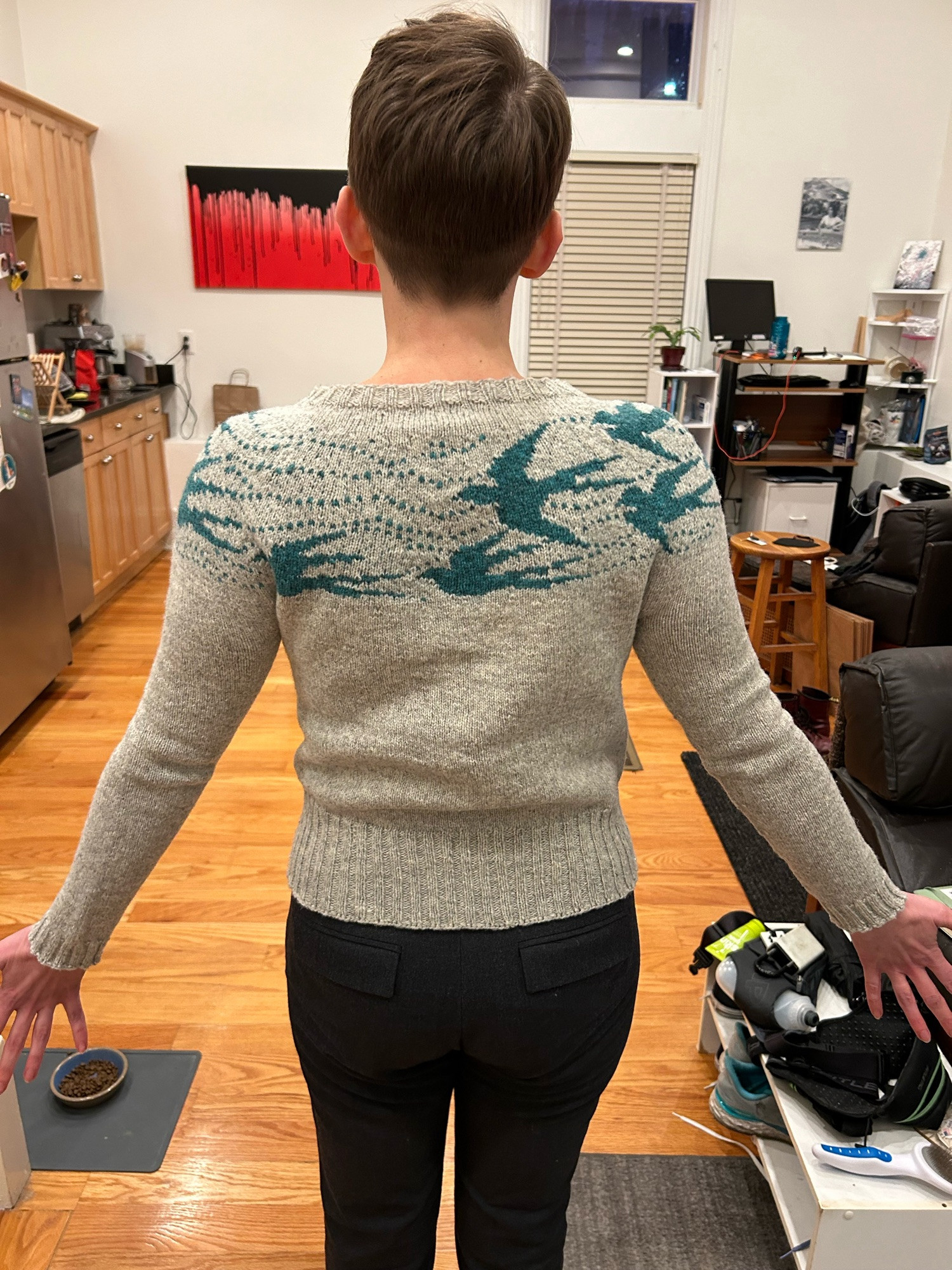 bird sweater on its recipient. it fits perfectly thank you very much.