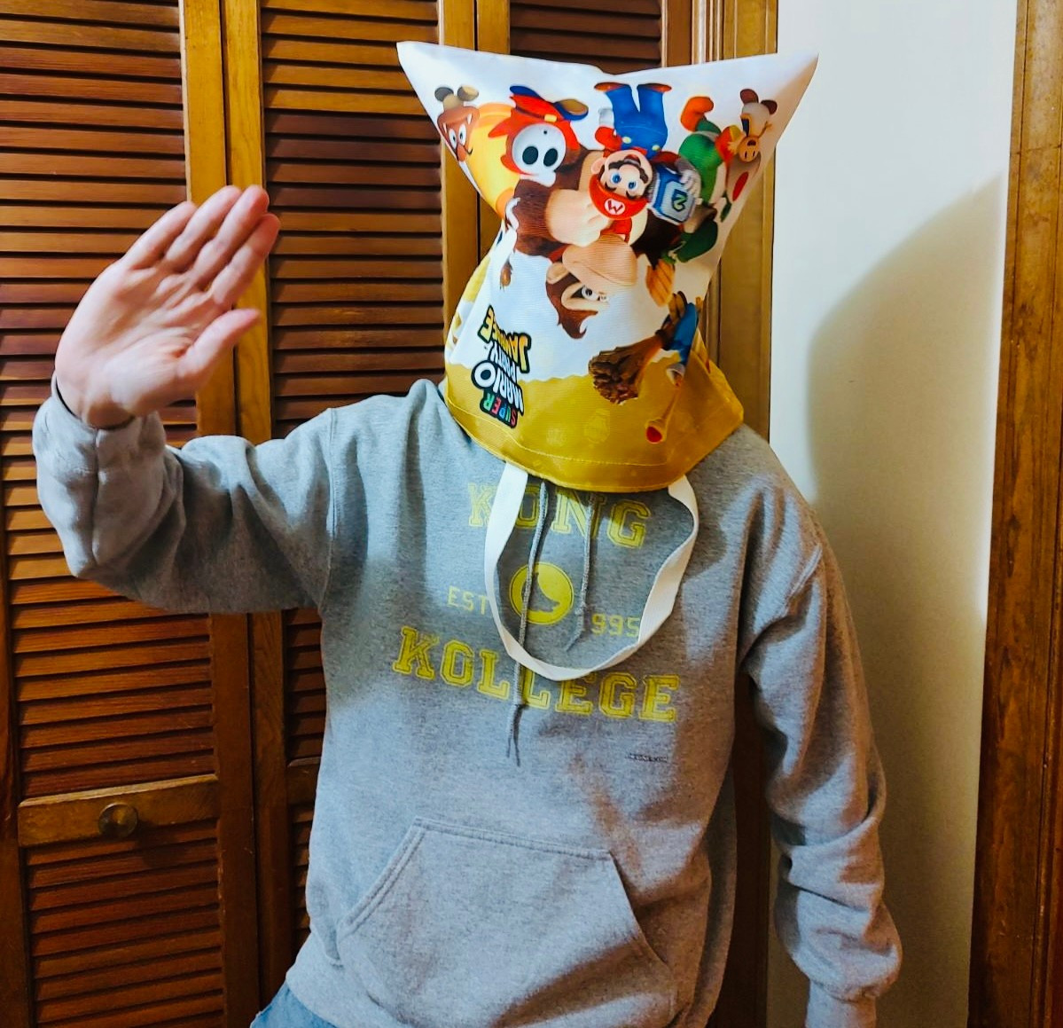 DK Vine's Hyle wearing the Best Buy Super Mario Party Jamboree bonus tote bag over his head as he elevates the art of comedy to new heights.