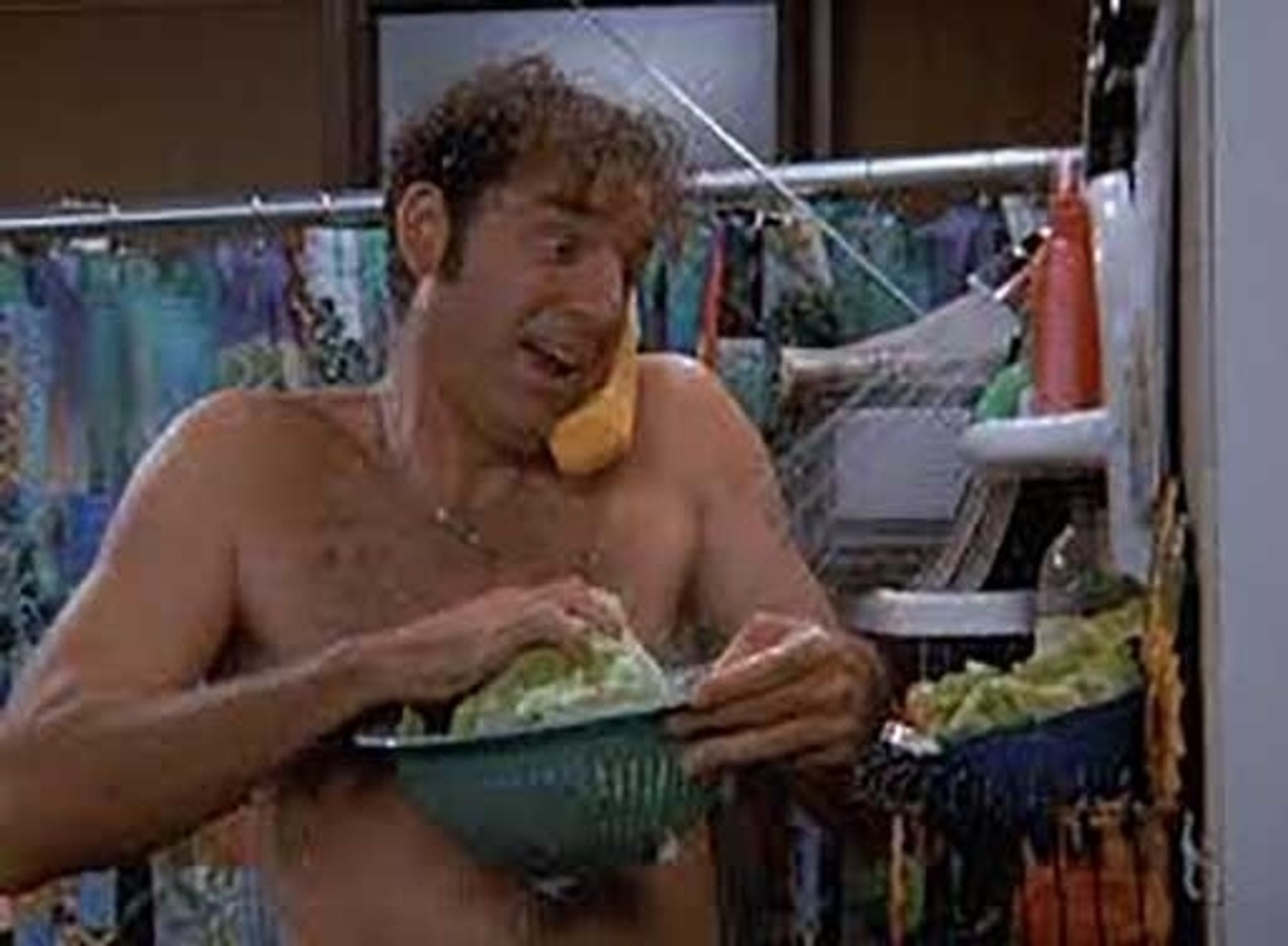 Cosmo Kramer from Seinfeld prepares a salad in the shower while he takes a shower and chats on the phone.