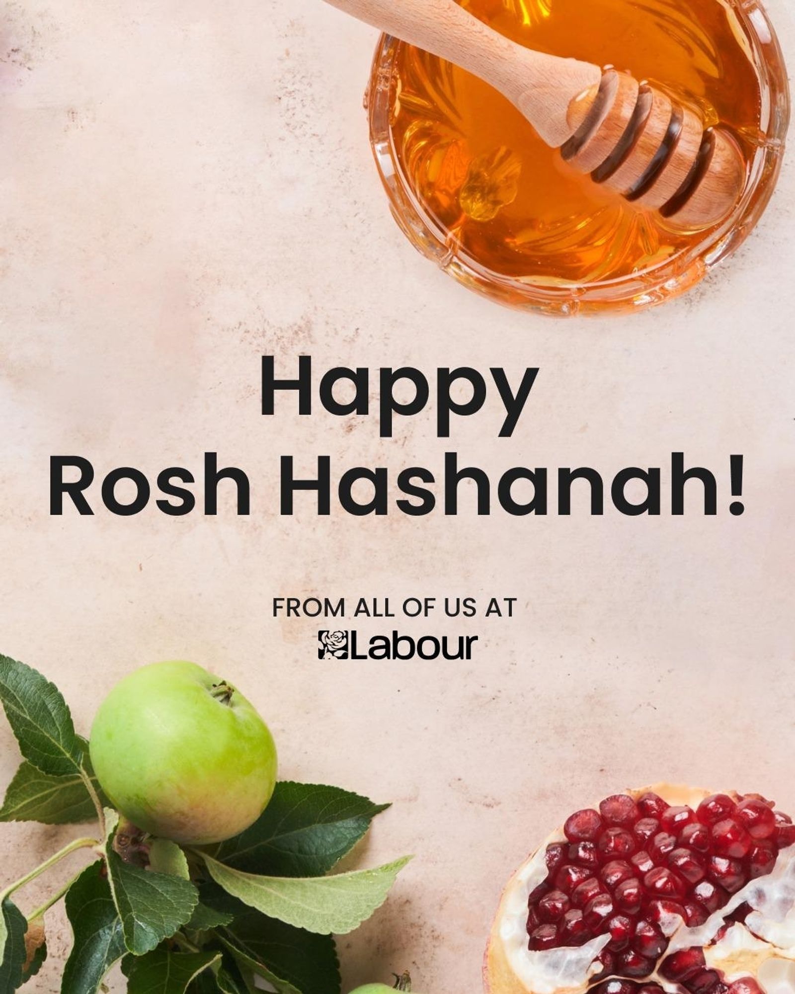 A graphic from the Labour Party with apples, honey and pomegranate saying "Happy Rosh Hashanah! From all of us at Labour"