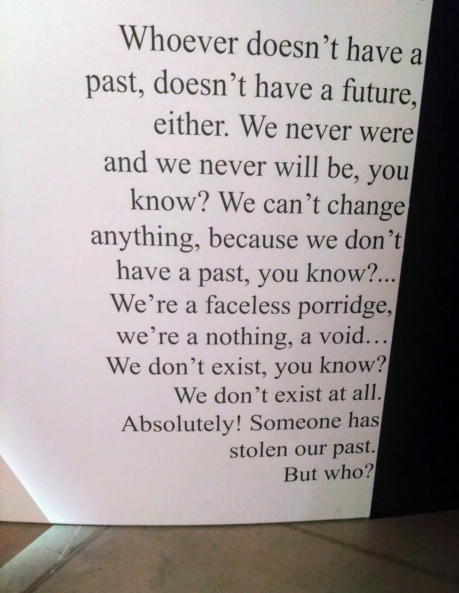 Kuva näyttelytekstistä: "Whoever doesn't have a past, doesn't have a future, either"